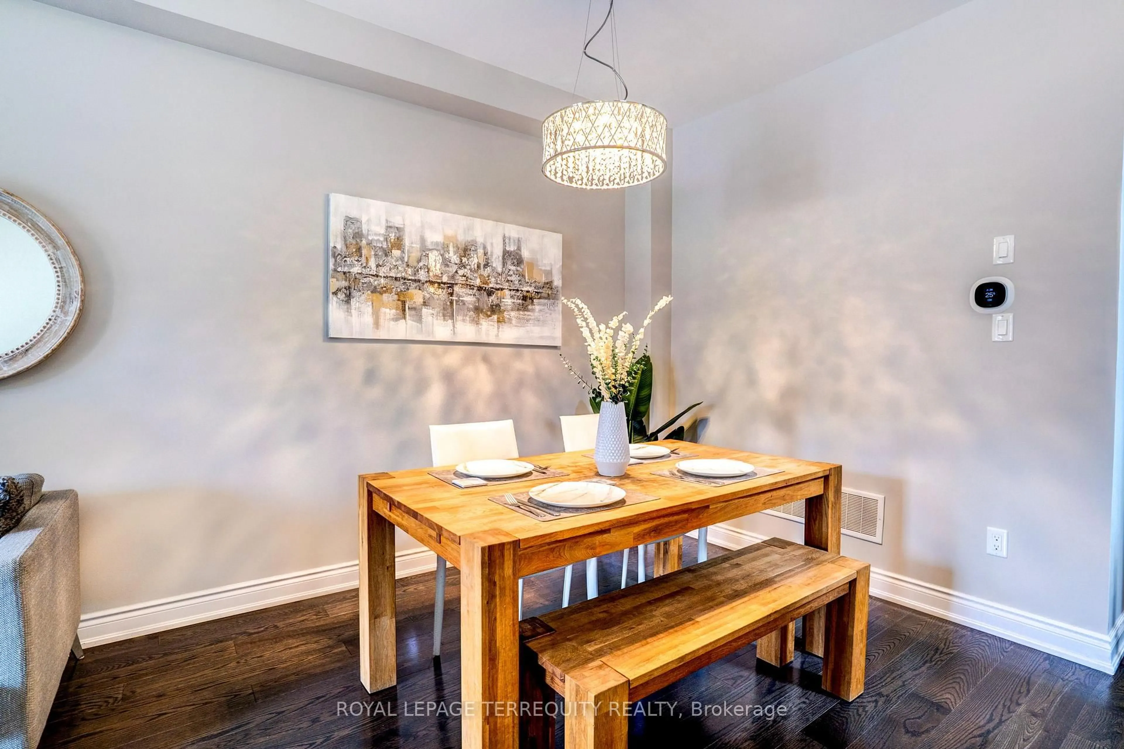Dining room, wood/laminate floor for 132 Thomas Fisher Dr #27, Toronto Ontario M8Z 0E4