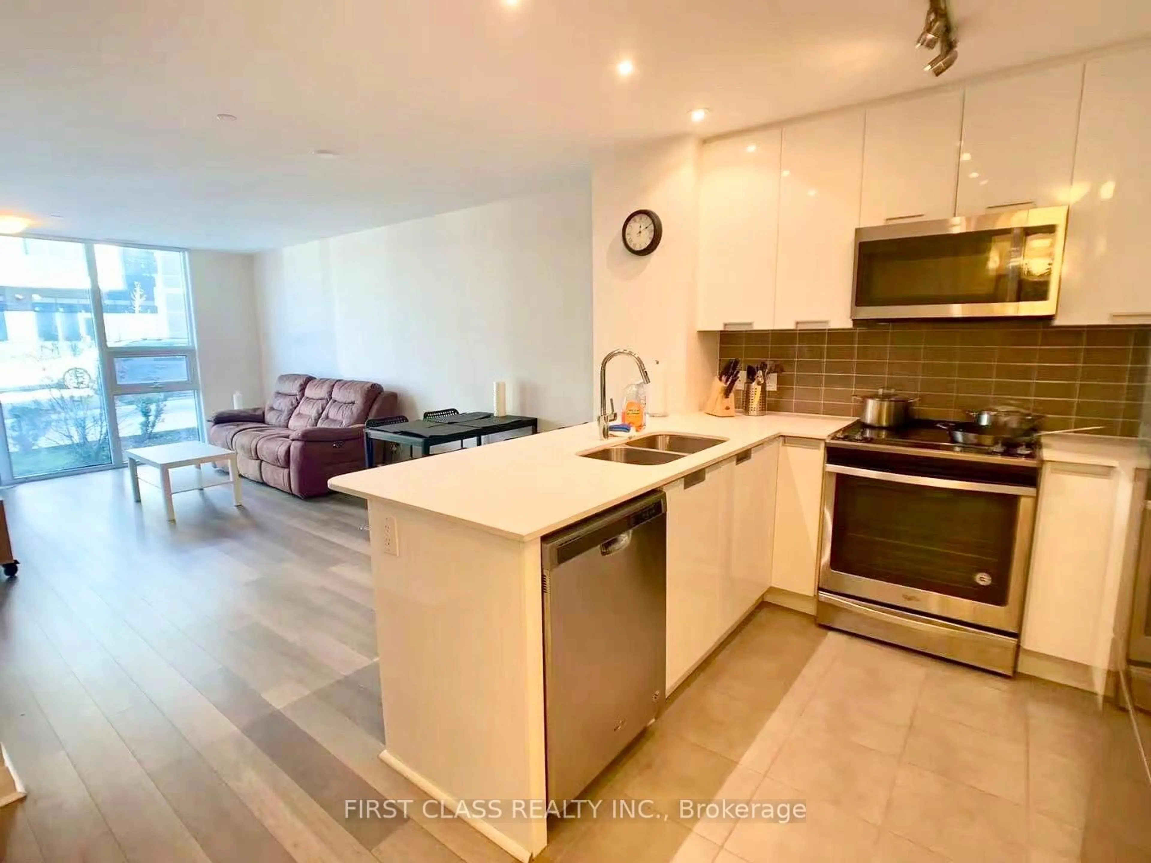Open concept kitchen, unknown for 5033 Four Springs Ave #117, Mississauga Ontario L5R 0G6