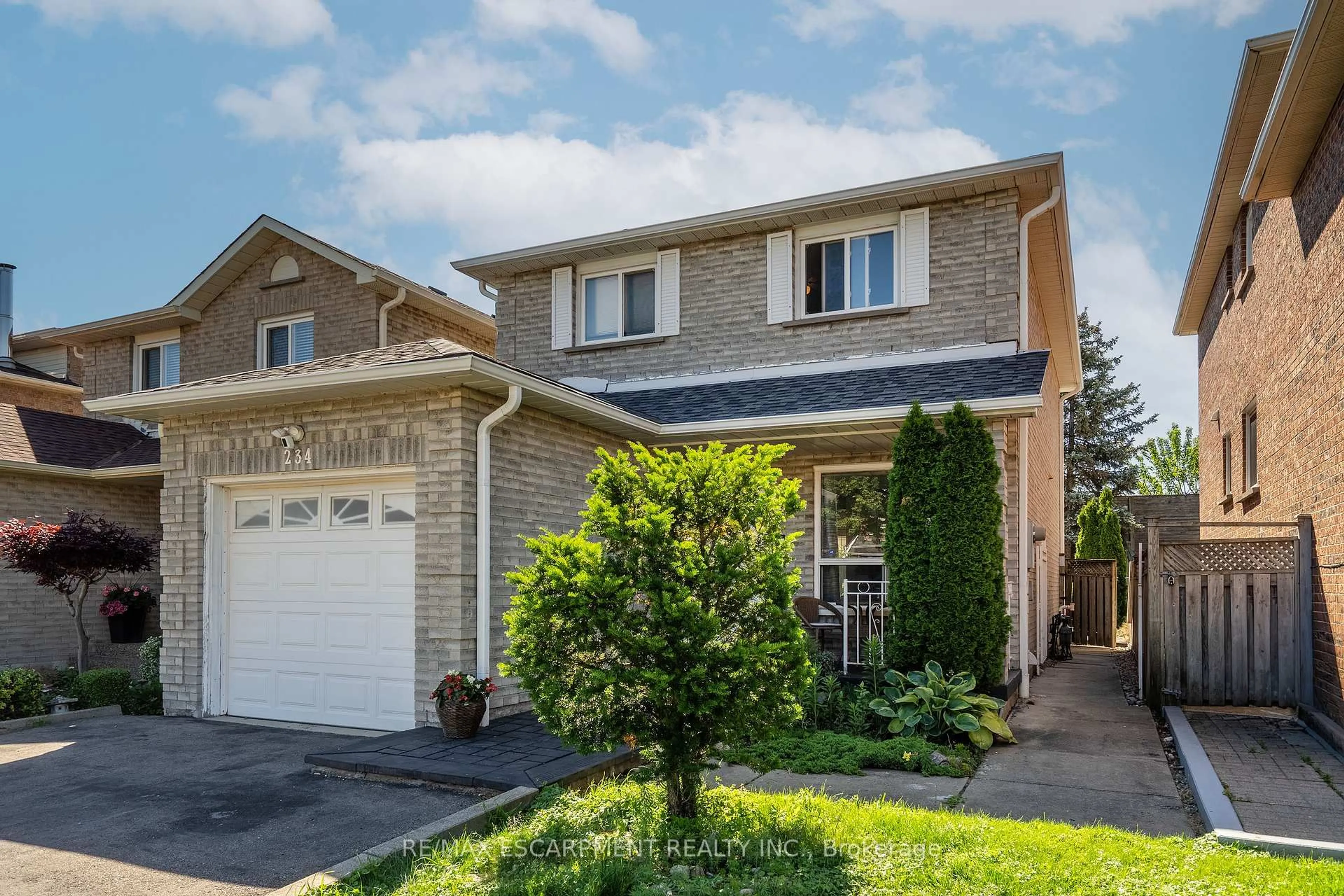 Home with brick exterior material, street for 234 Lech Walesa Dr, Mississauga Ontario L5B 3H3