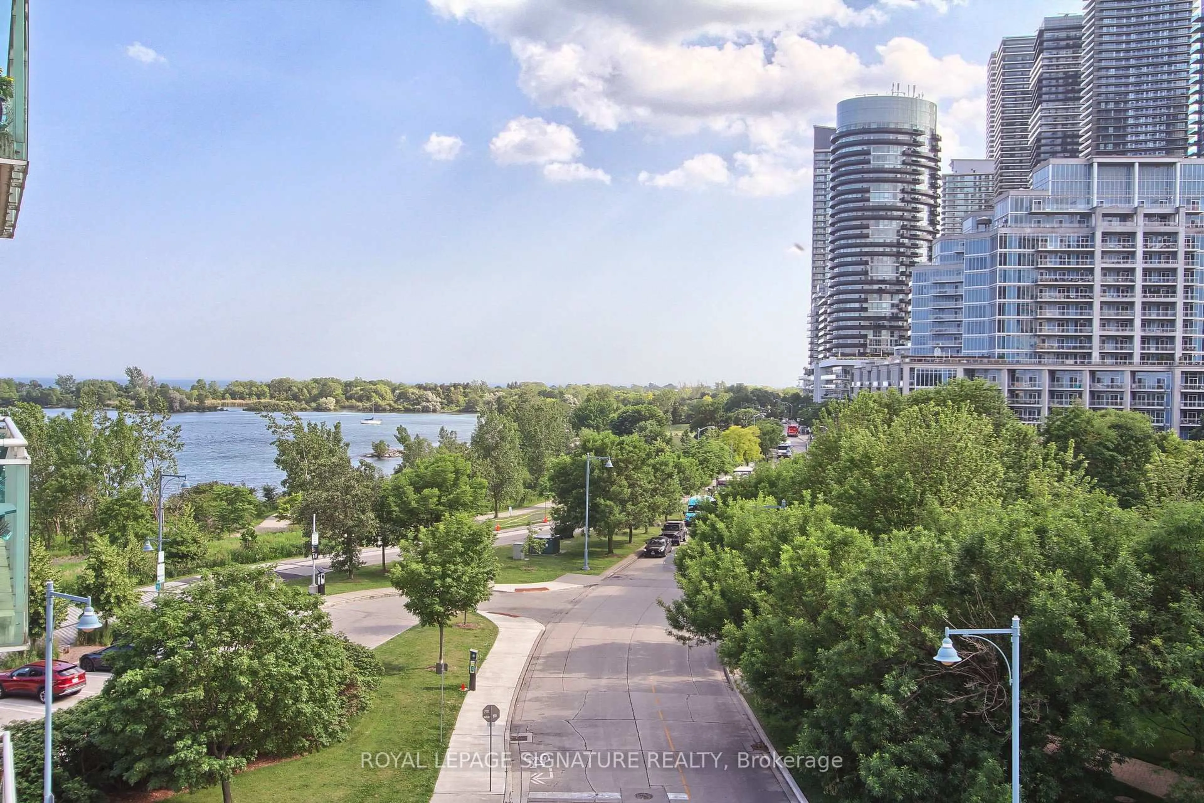 A pic from outside/outdoor area/front of a property/back of a property/a pic from drone, water/lake/river/ocean view for 5 Marine Parade Dr #507, Toronto Ontario M8V 4B4