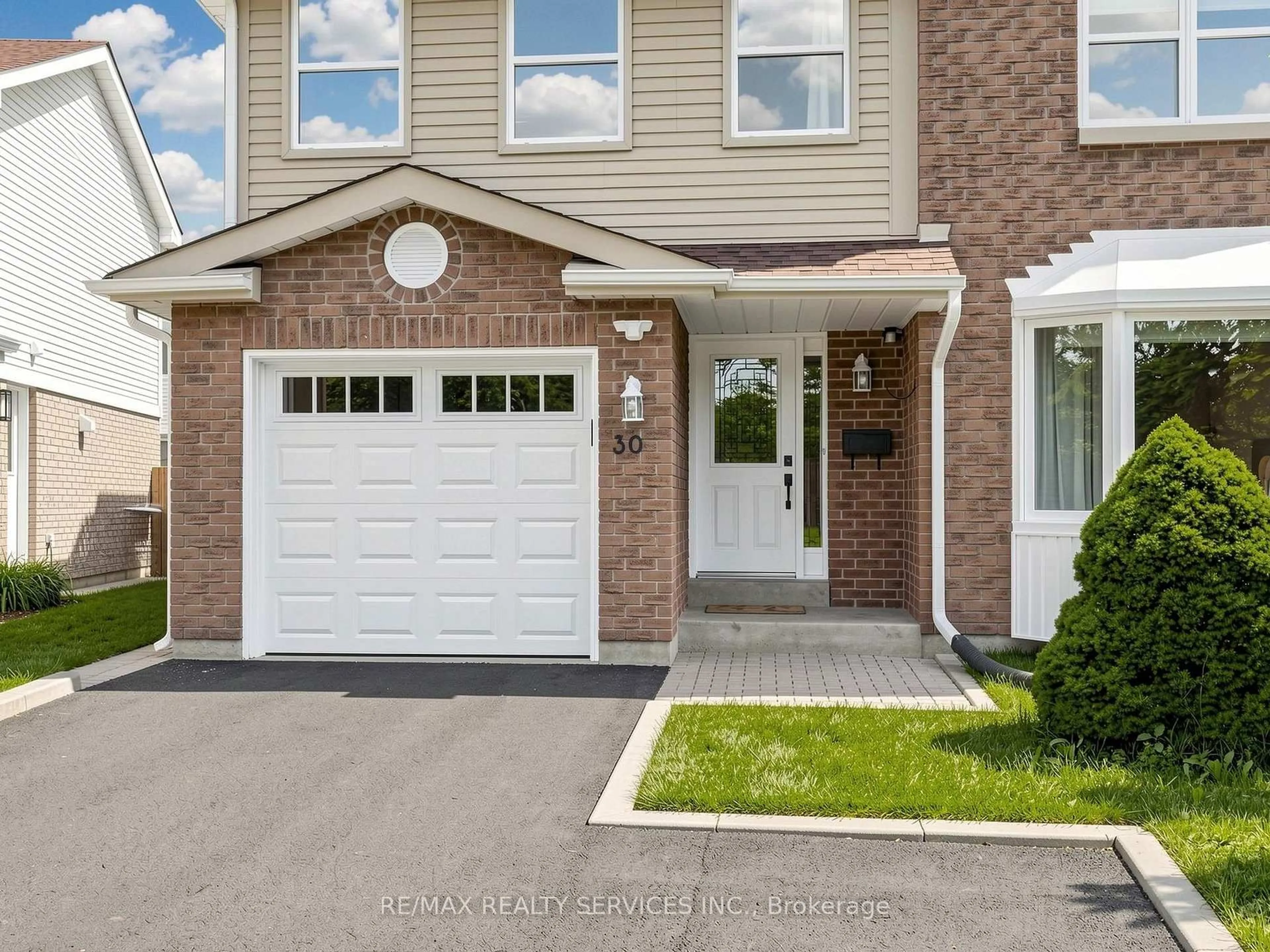 Home with brick exterior material, street for 30 Mcgillivary Cres, Brampton Ontario L6S 3P7