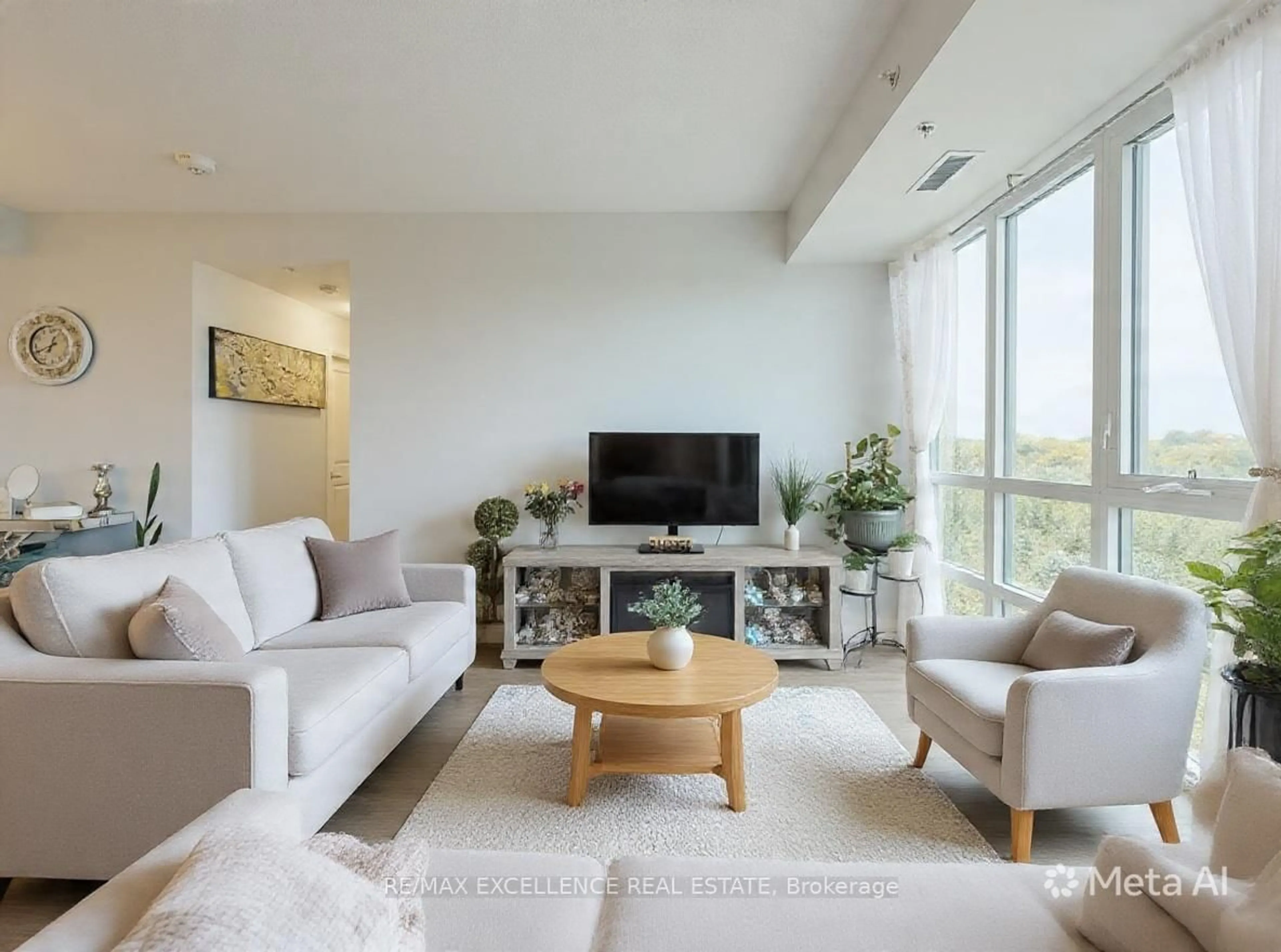 Living room with furniture, unknown for 65 Yorkland Blvd #309, Brampton Ontario L6P 4M5