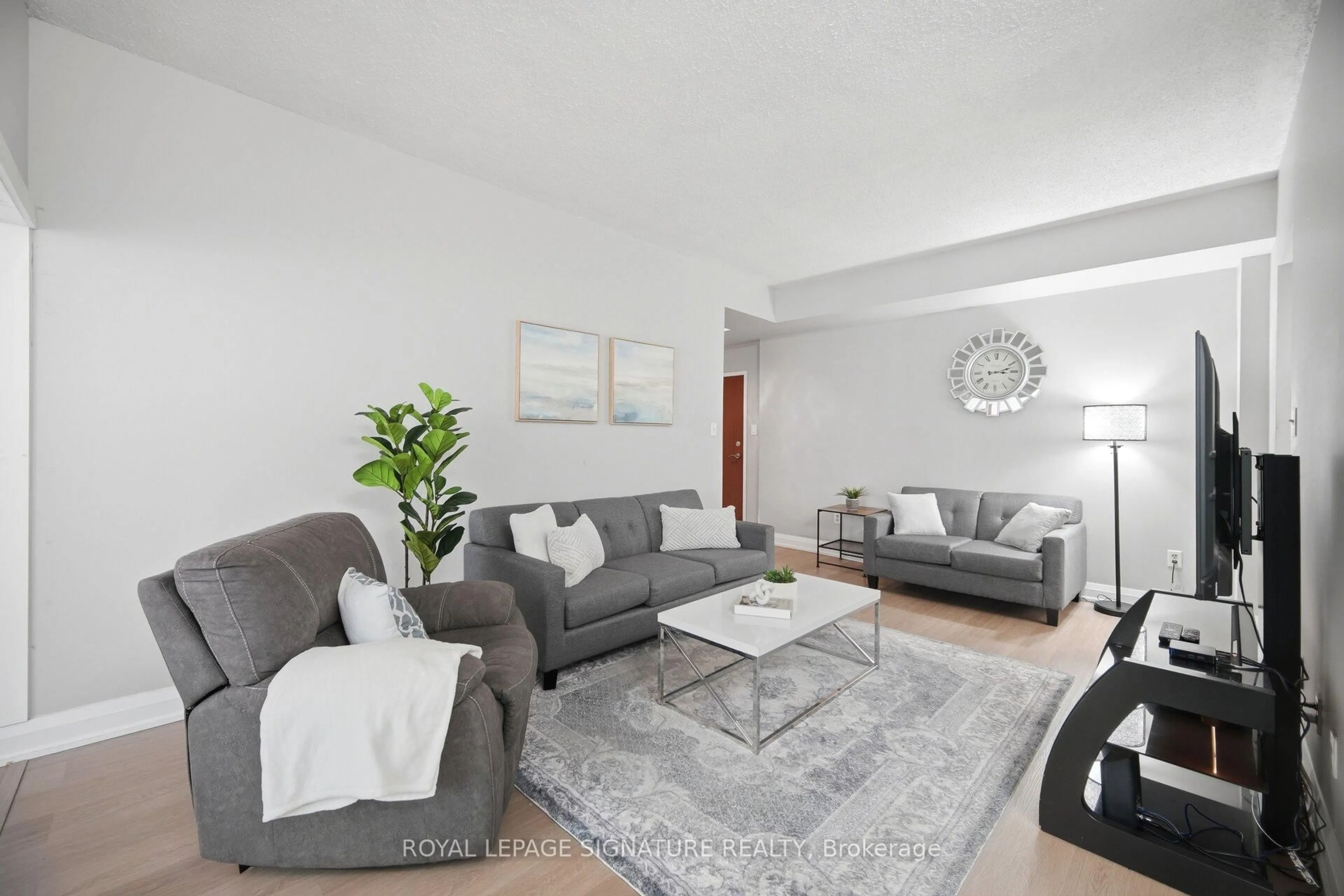 Living room with furniture, unknown for 5 Lisa St #109, Brampton Ontario L6T 4T4