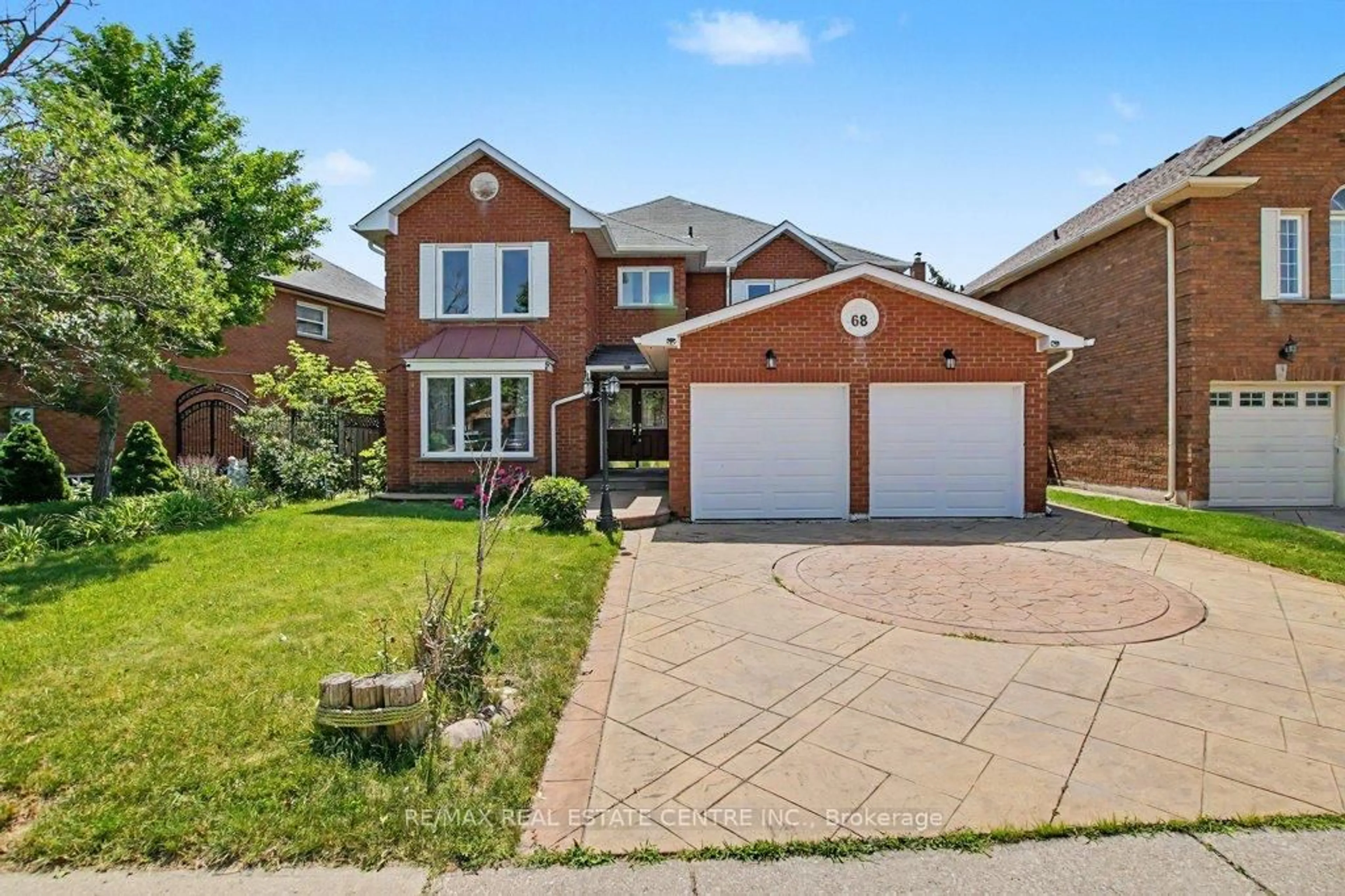 Home with brick exterior material, street for 68 Moorehead Cres, Brampton Ontario L6Z 4J6