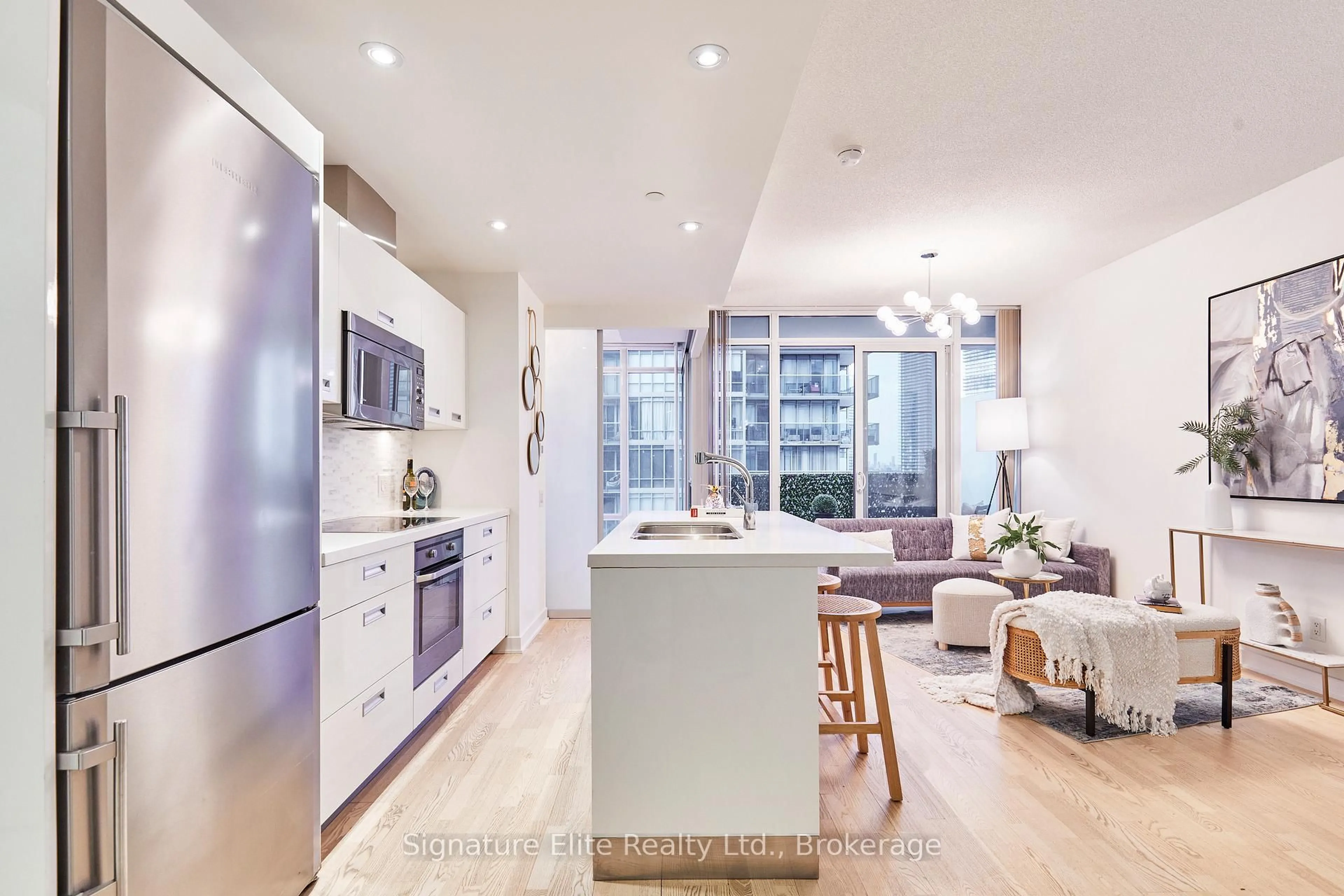 Open concept kitchen, wood/laminate floor for 88 Park Lawn Rd #1210, Toronto Ontario M8Y 0B5