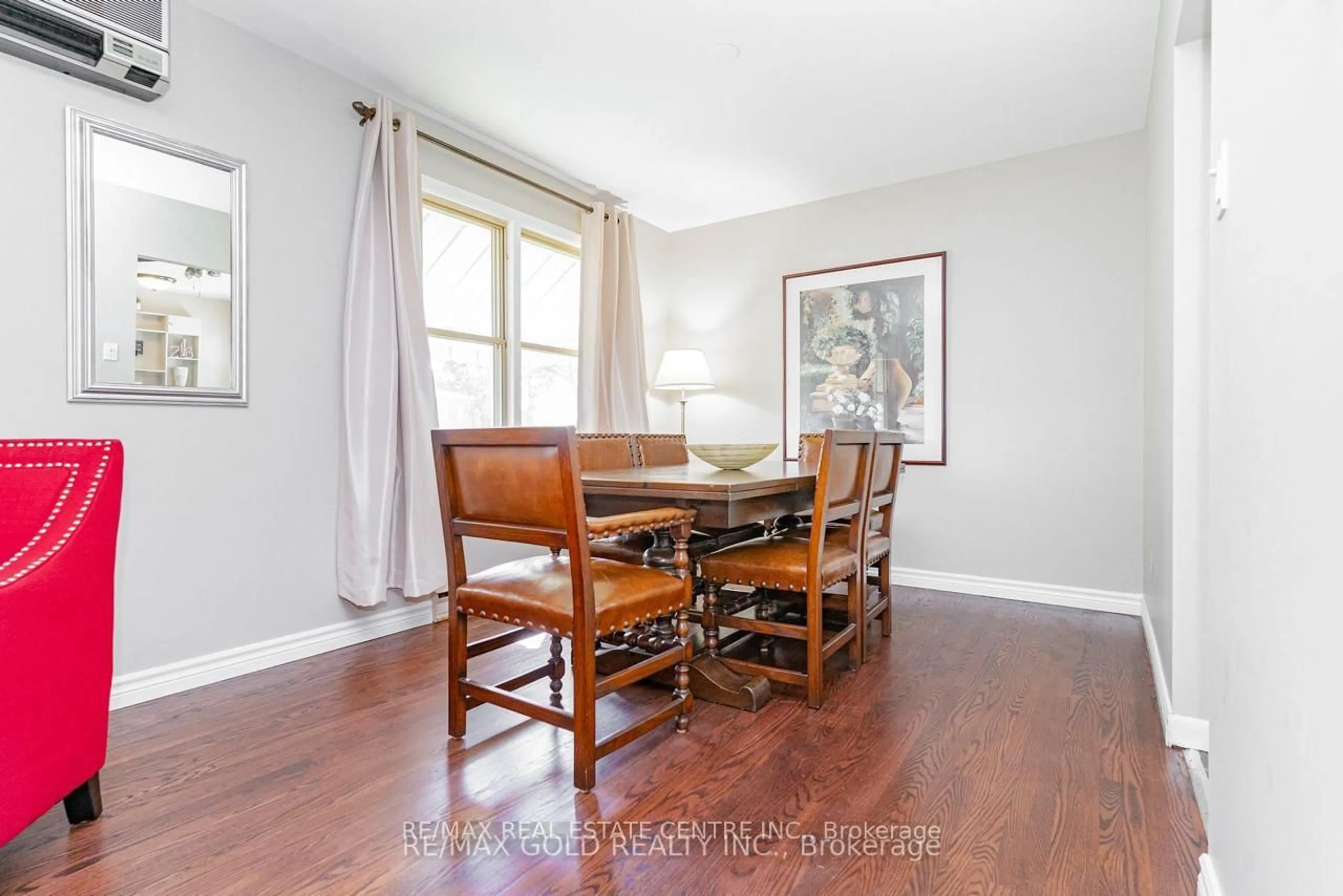 Dining room, wood/laminate floor for 67 Cavendish Cres, Brampton Ontario L6T 1Z4