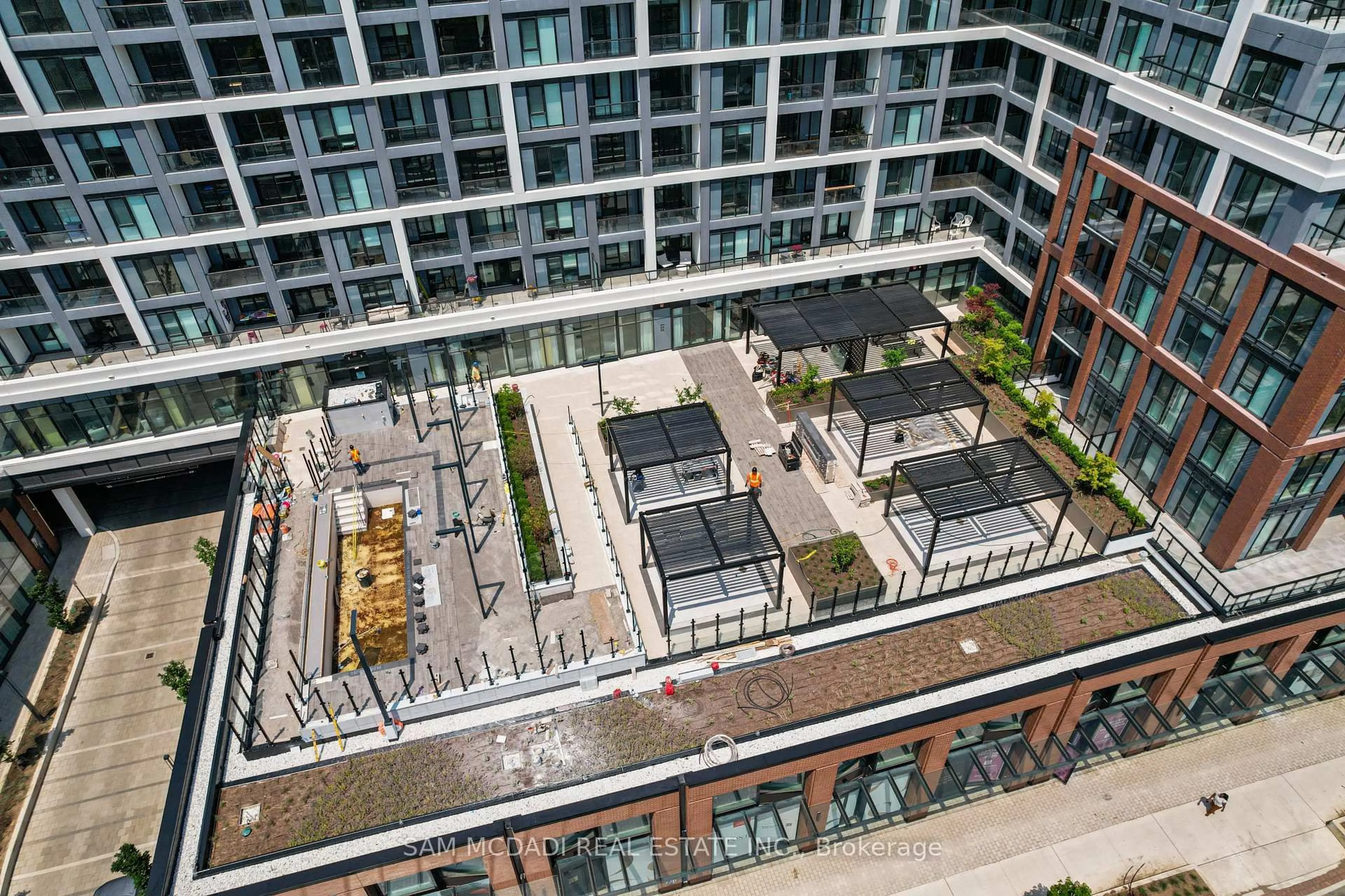 A pic from outside/outdoor area/front of a property/back of a property/a pic from drone, city buildings view from balcony for 858 Dupont St #304, Toronto Ontario M6G 0C1
