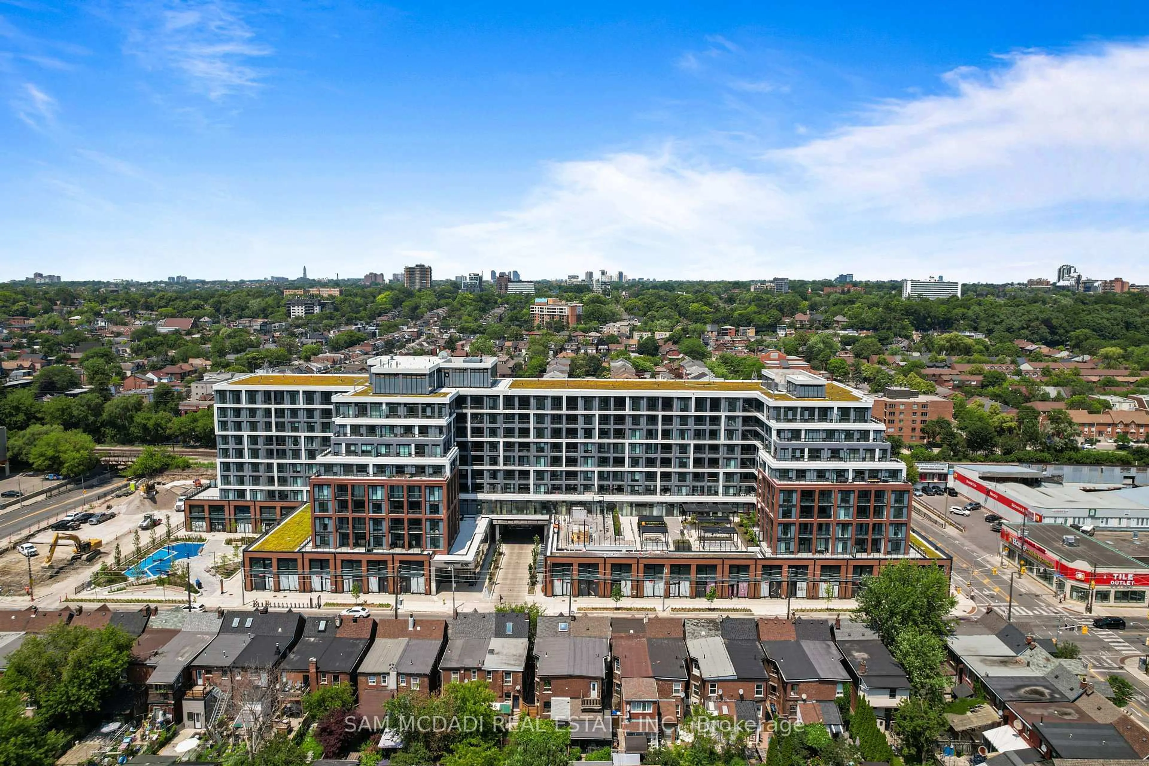 A pic from outside/outdoor area/front of a property/back of a property/a pic from drone, city buildings view from balcony for 858 Dupont St #304, Toronto Ontario M6G 0C1