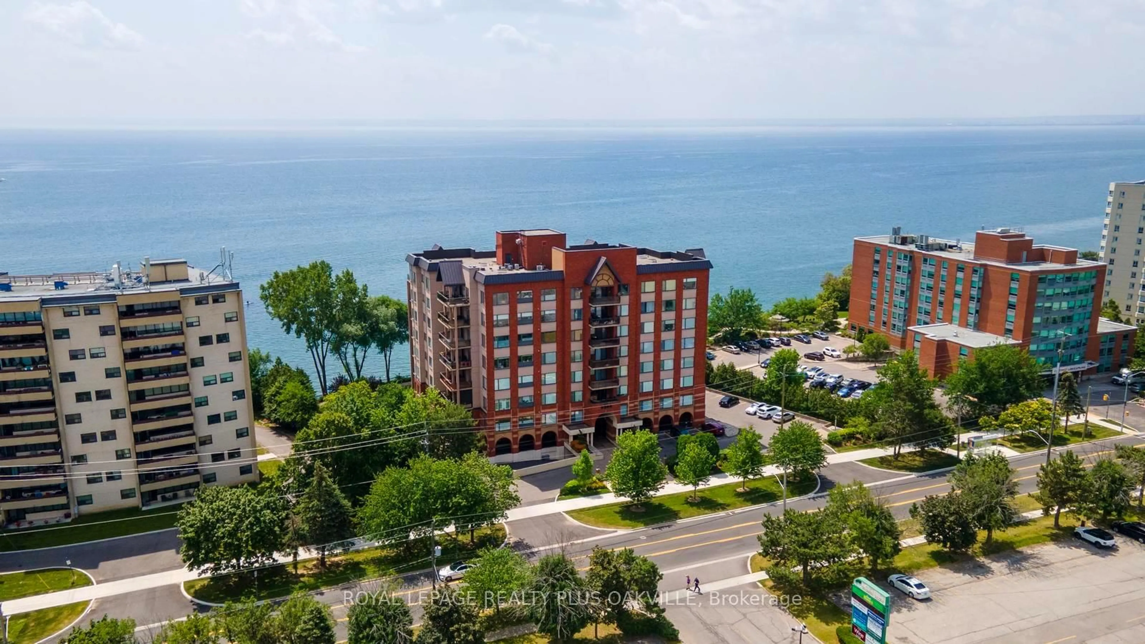A pic from outside/outdoor area/front of a property/back of a property/a pic from drone, water/lake/river/ocean view for 5340 Lakeshore Rd #604, Burlington Ontario L7L 7A8