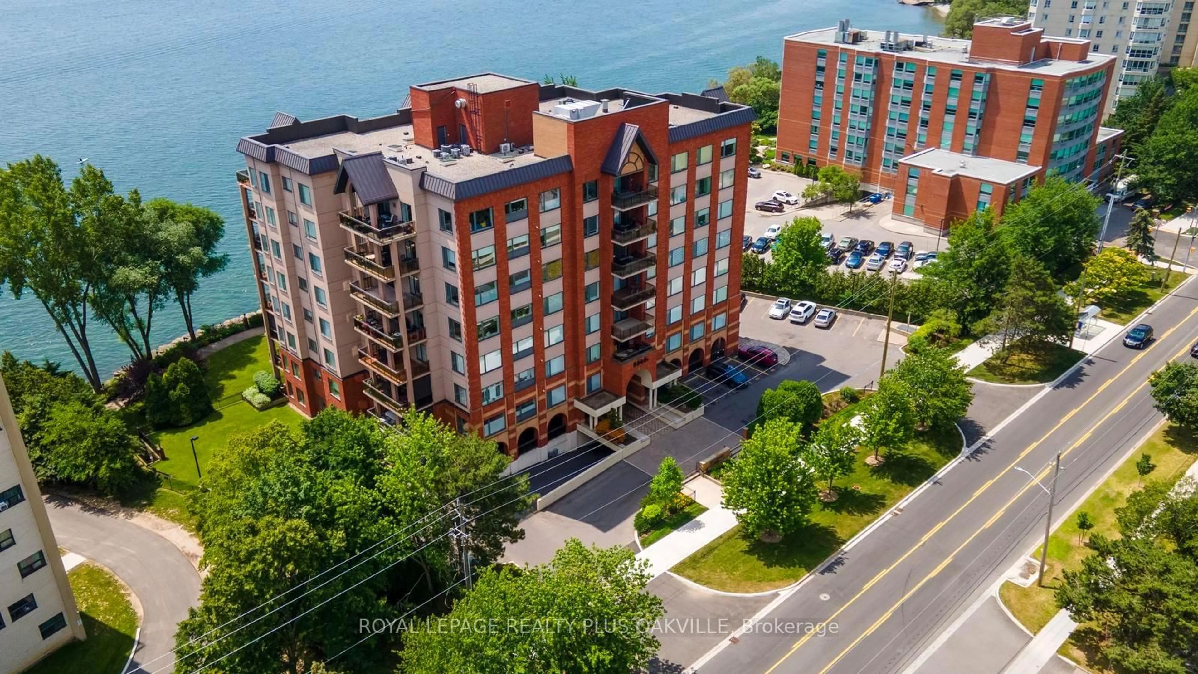 A pic from outside/outdoor area/front of a property/back of a property/a pic from drone, water/lake/river/ocean view for 5340 Lakeshore Rd #604, Burlington Ontario L7L 7A8