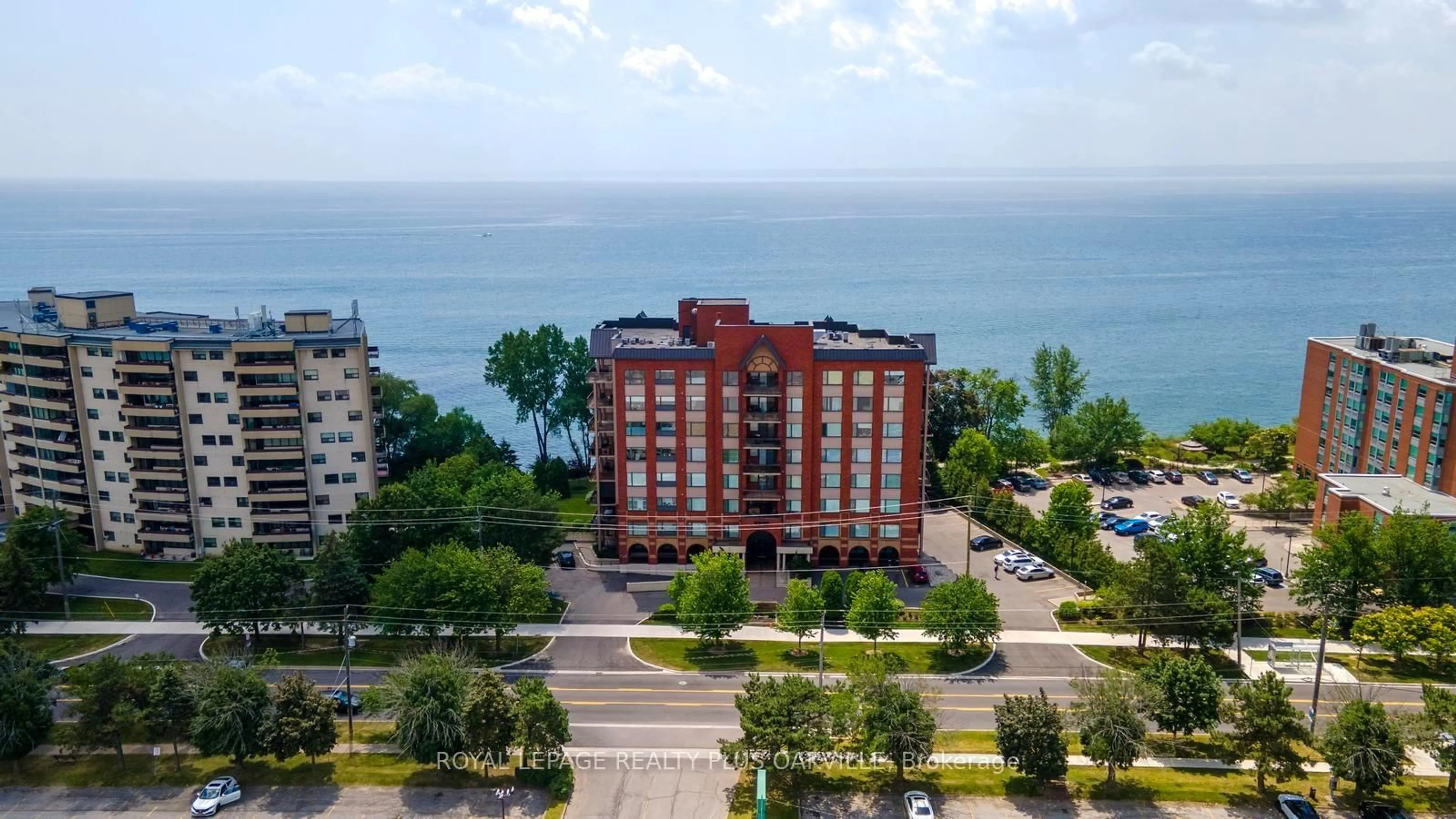 A pic from outside/outdoor area/front of a property/back of a property/a pic from drone, water/lake/river/ocean view for 5340 Lakeshore Rd #604, Burlington Ontario L7L 7A8