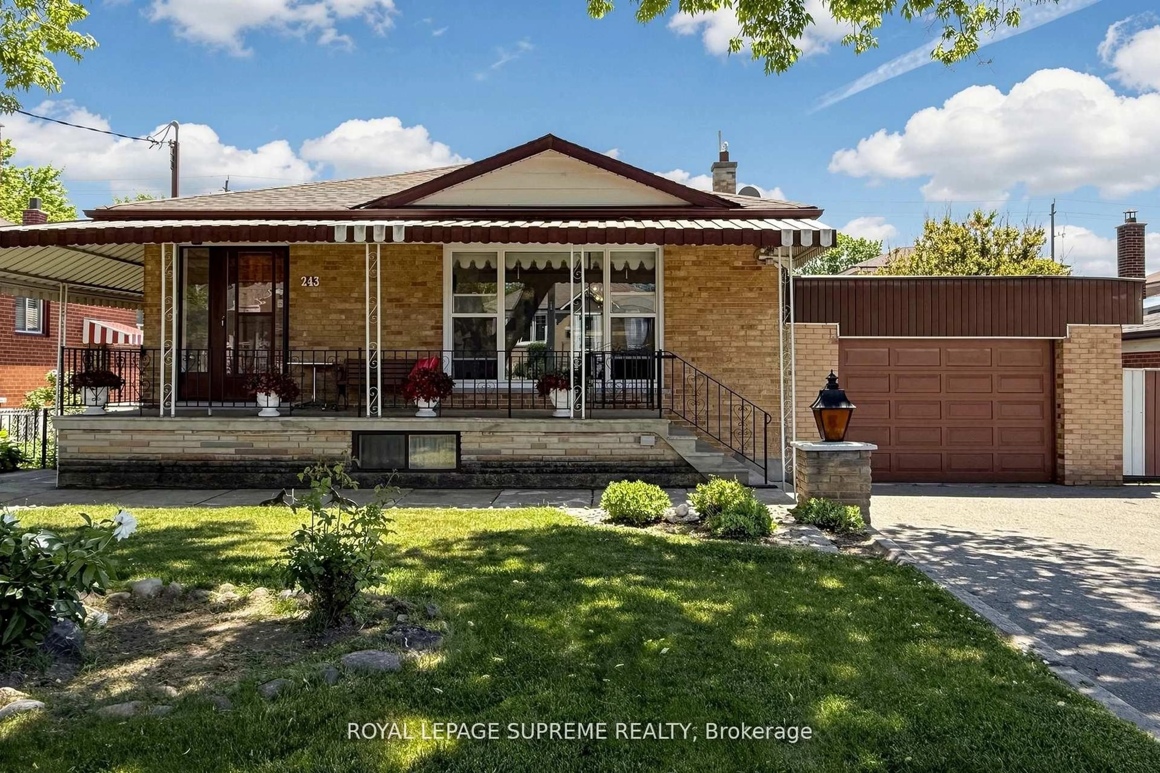 Home with brick exterior material, street for 243 Epsom Downs Dr, Toronto Ontario M3M 1T3
