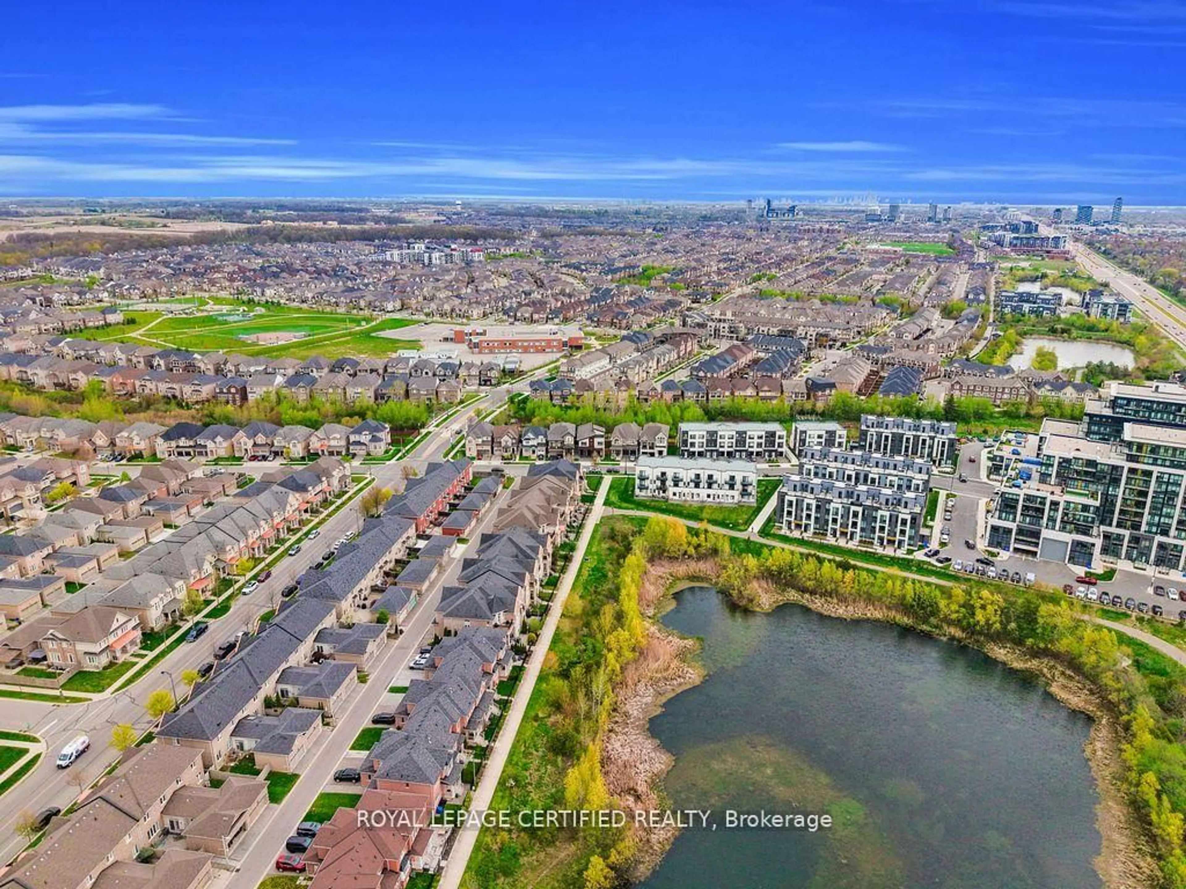 A pic from outside/outdoor area/front of a property/back of a property/a pic from drone, water/lake/river/ocean view for 3071 Trailside Dr, Oakville Ontario L6M 0Z4