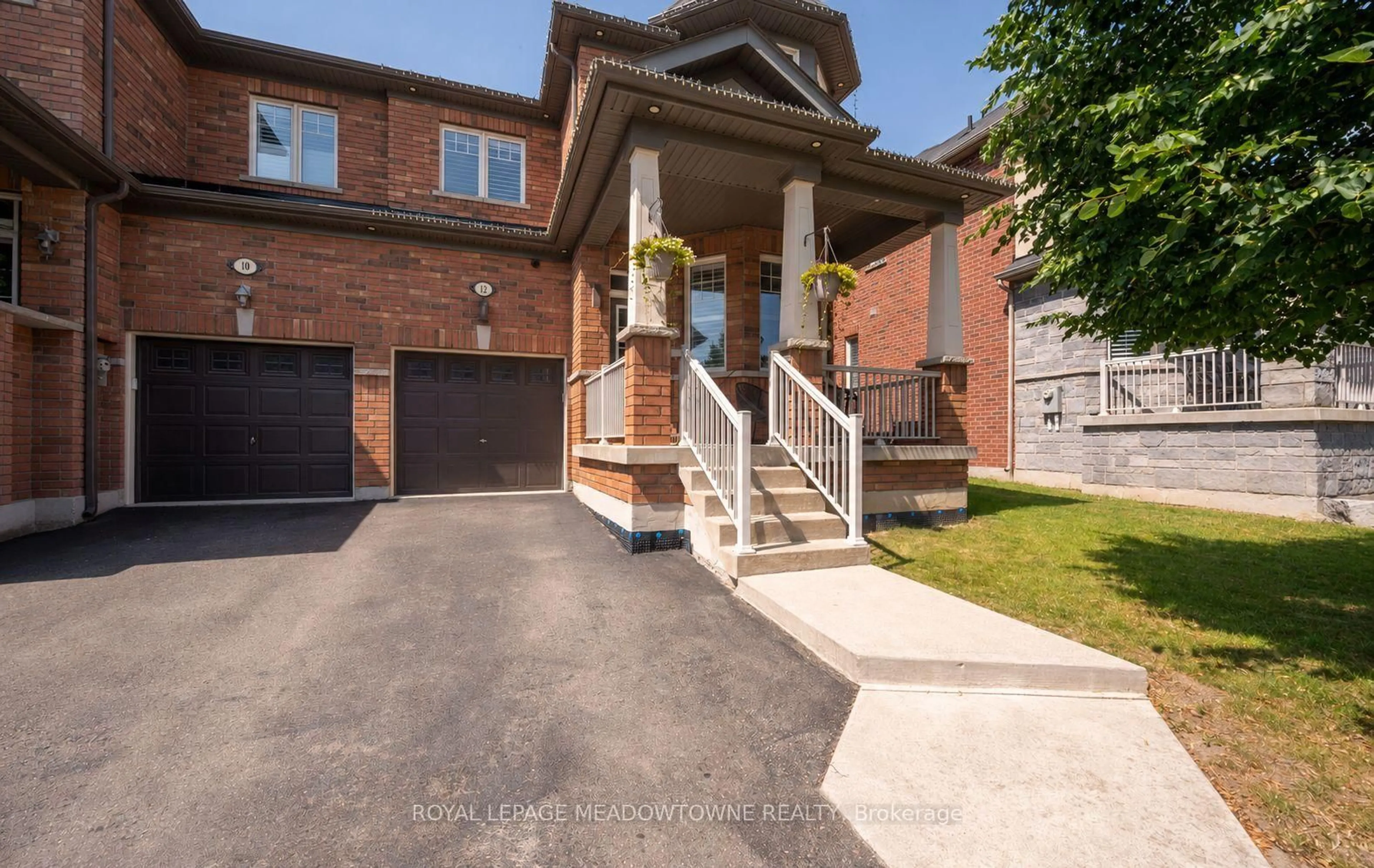 Home with brick exterior material, street for 12 Shediac Rd, Brampton Ontario L6Y 0V8