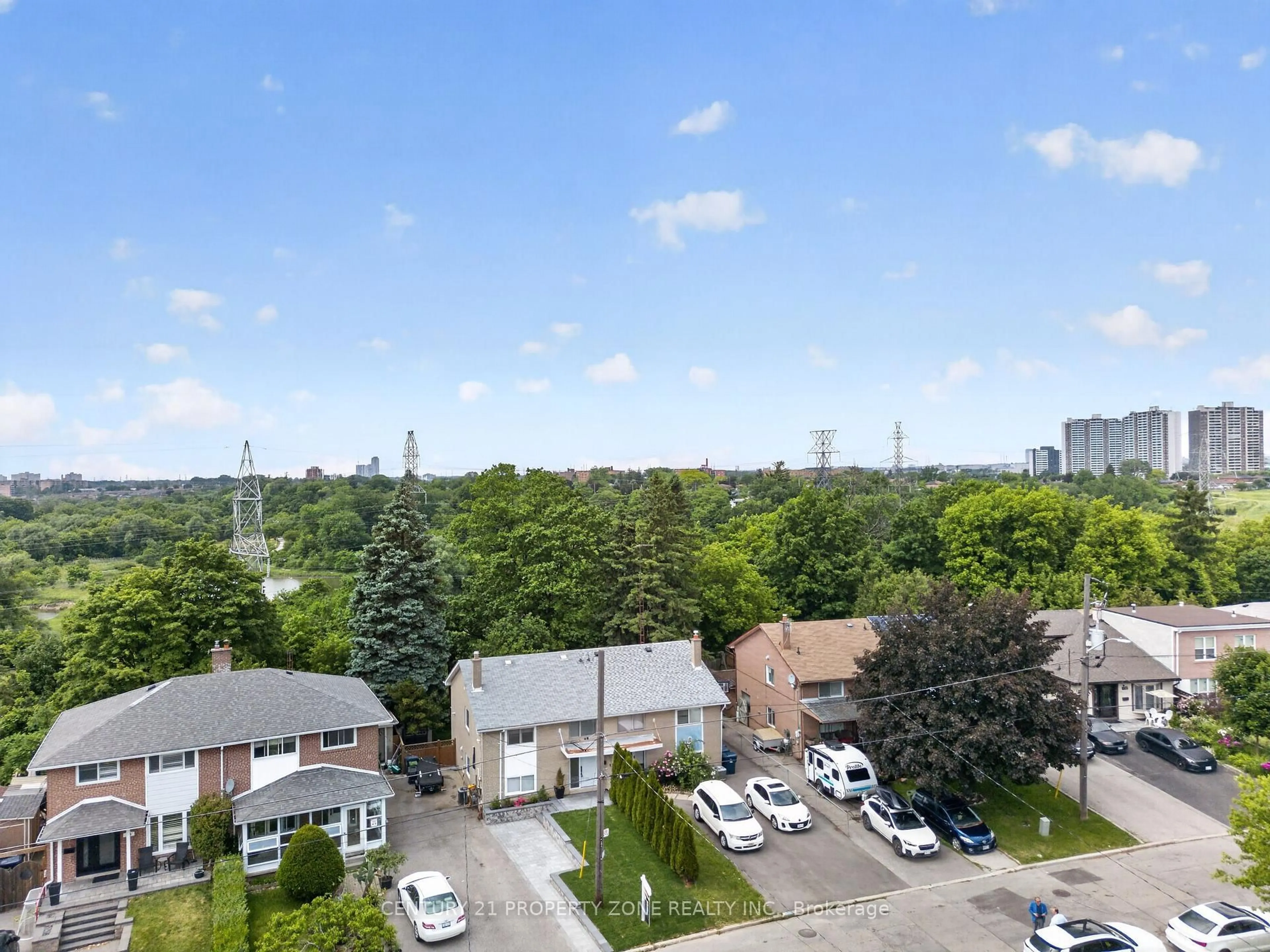 A pic from outside/outdoor area/front of a property/back of a property/a pic from drone, city buildings view from balcony for 121 Saint Lucie Dr, Toronto Ontario M9M 1T4