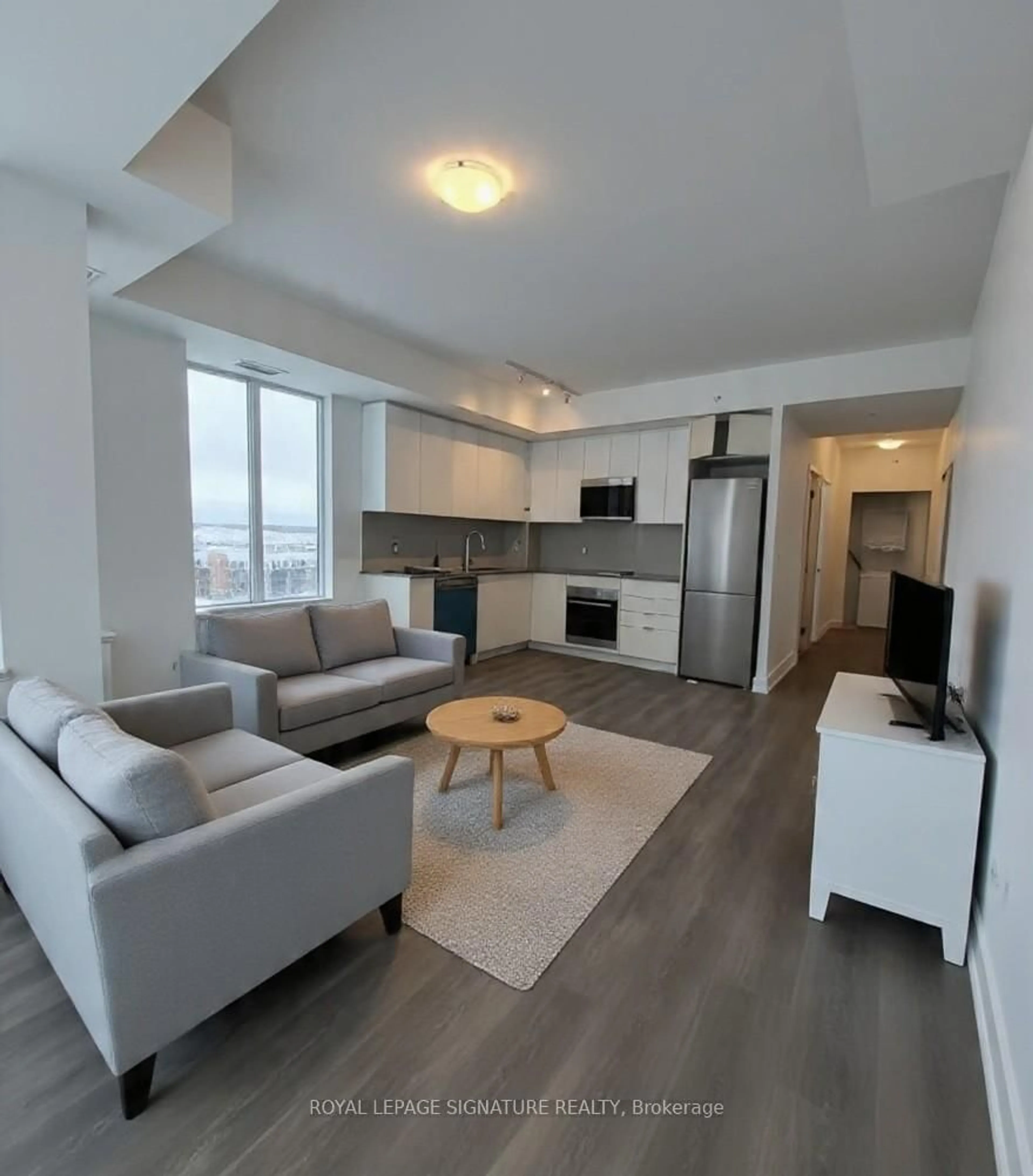 Living room with furniture, unknown for 2489 Taunton Rd #713, Oakville Ontario L6H 3R9