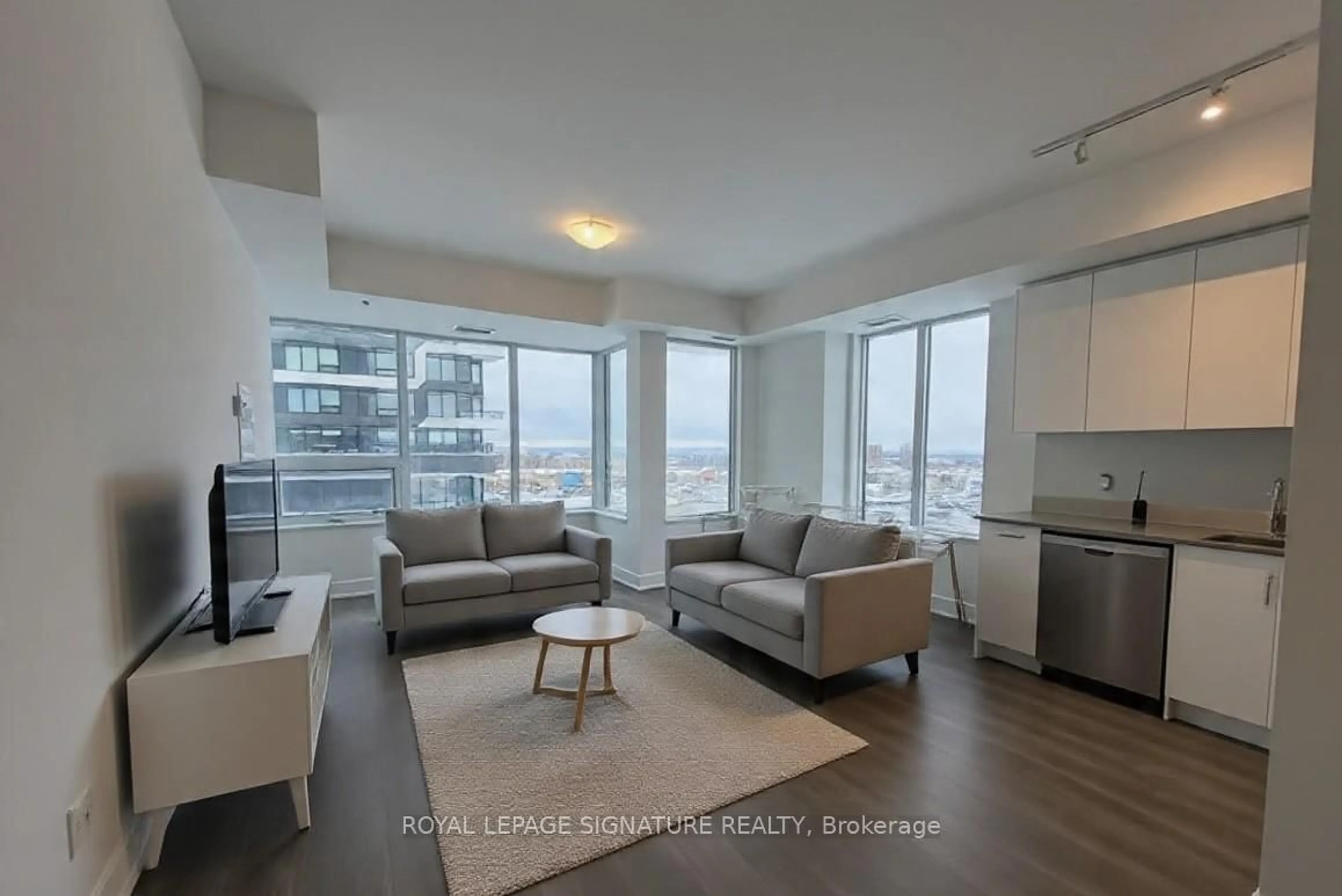 Living room with furniture, unknown for 2489 Taunton Rd #713, Oakville Ontario L6H 3R9