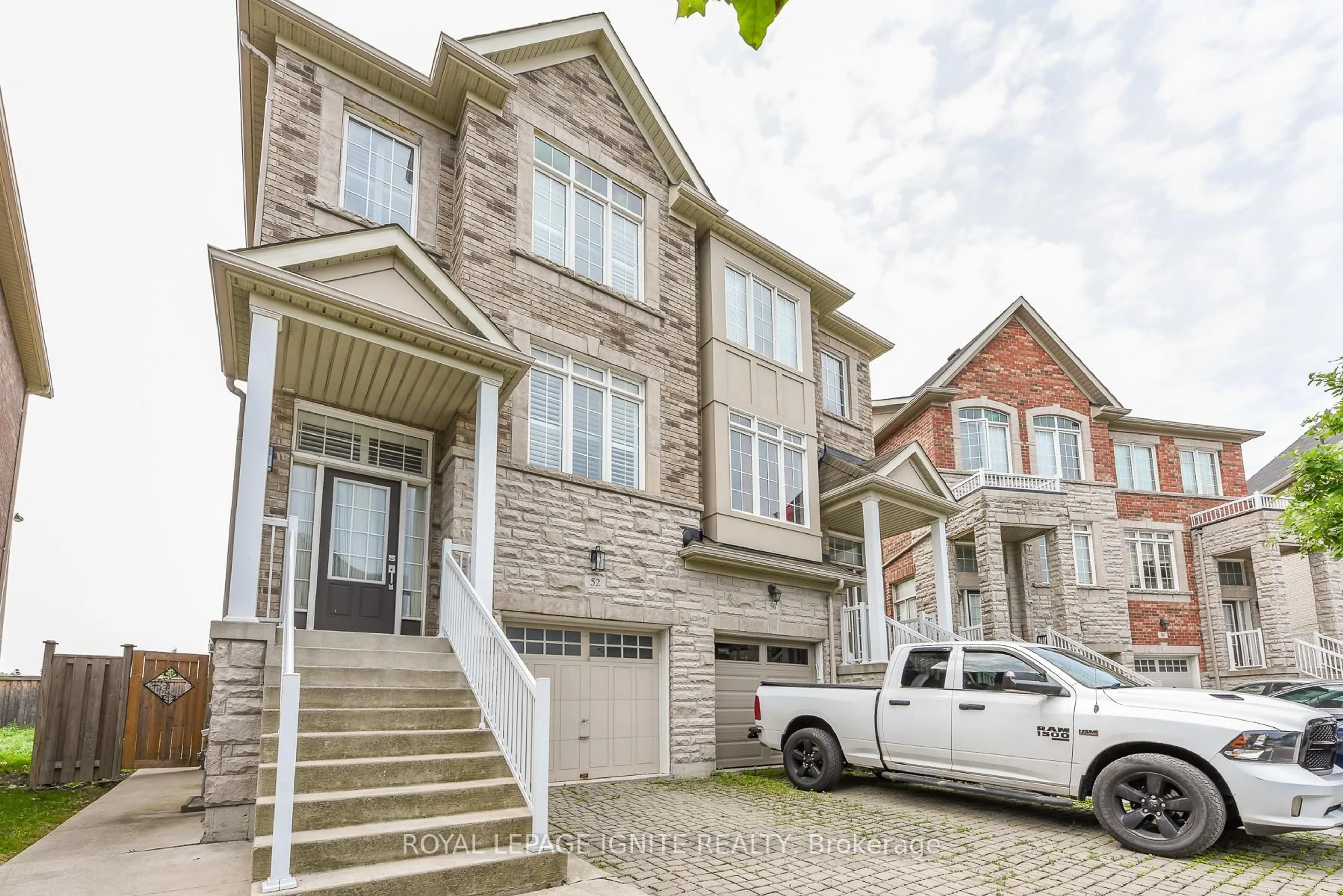 Home with brick exterior material, street for 52 Harpreet Circ, Toronto Ontario M9W 0E2