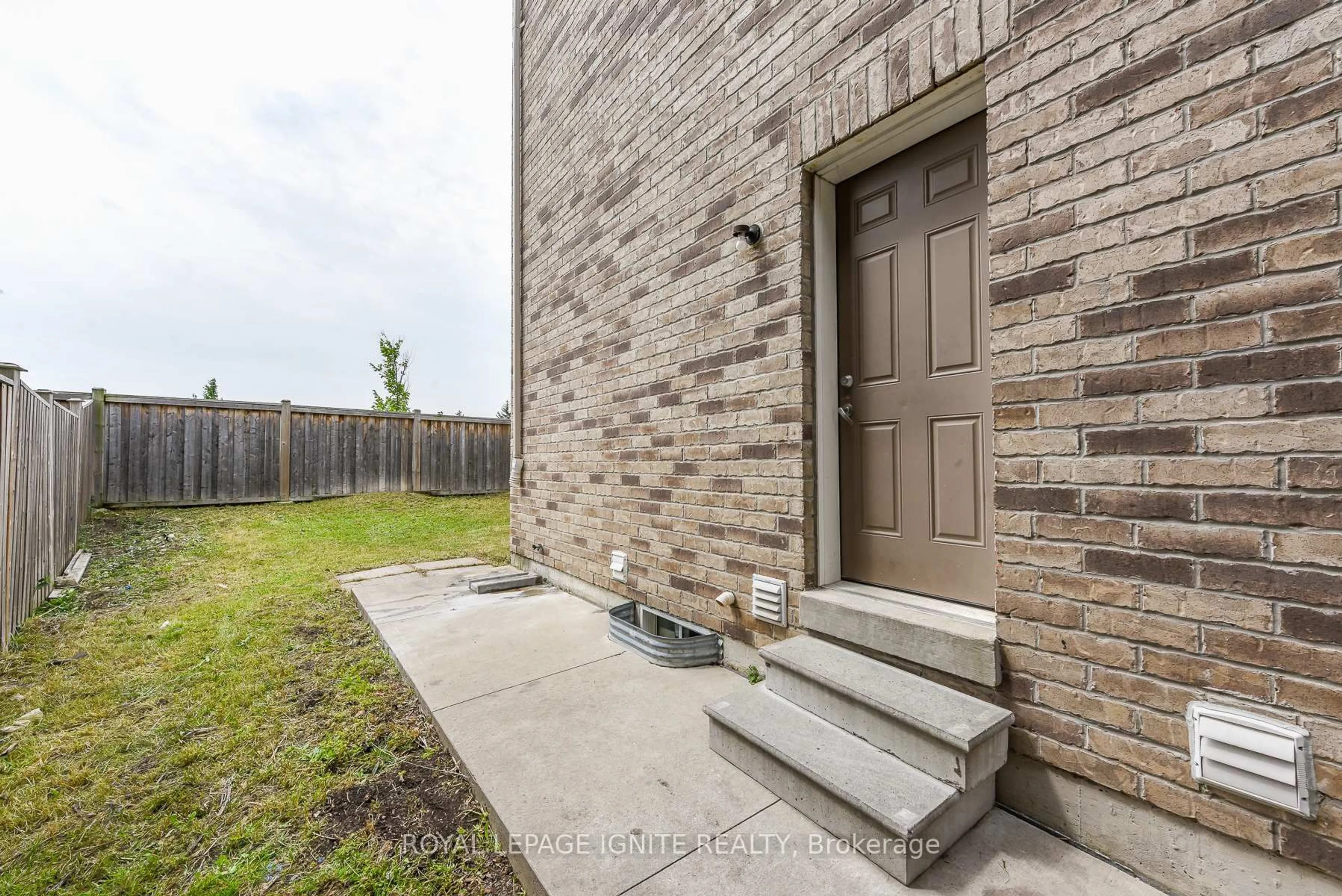 Home with brick exterior material, street for 52 Harpreet Circ, Toronto Ontario M9W 0E2