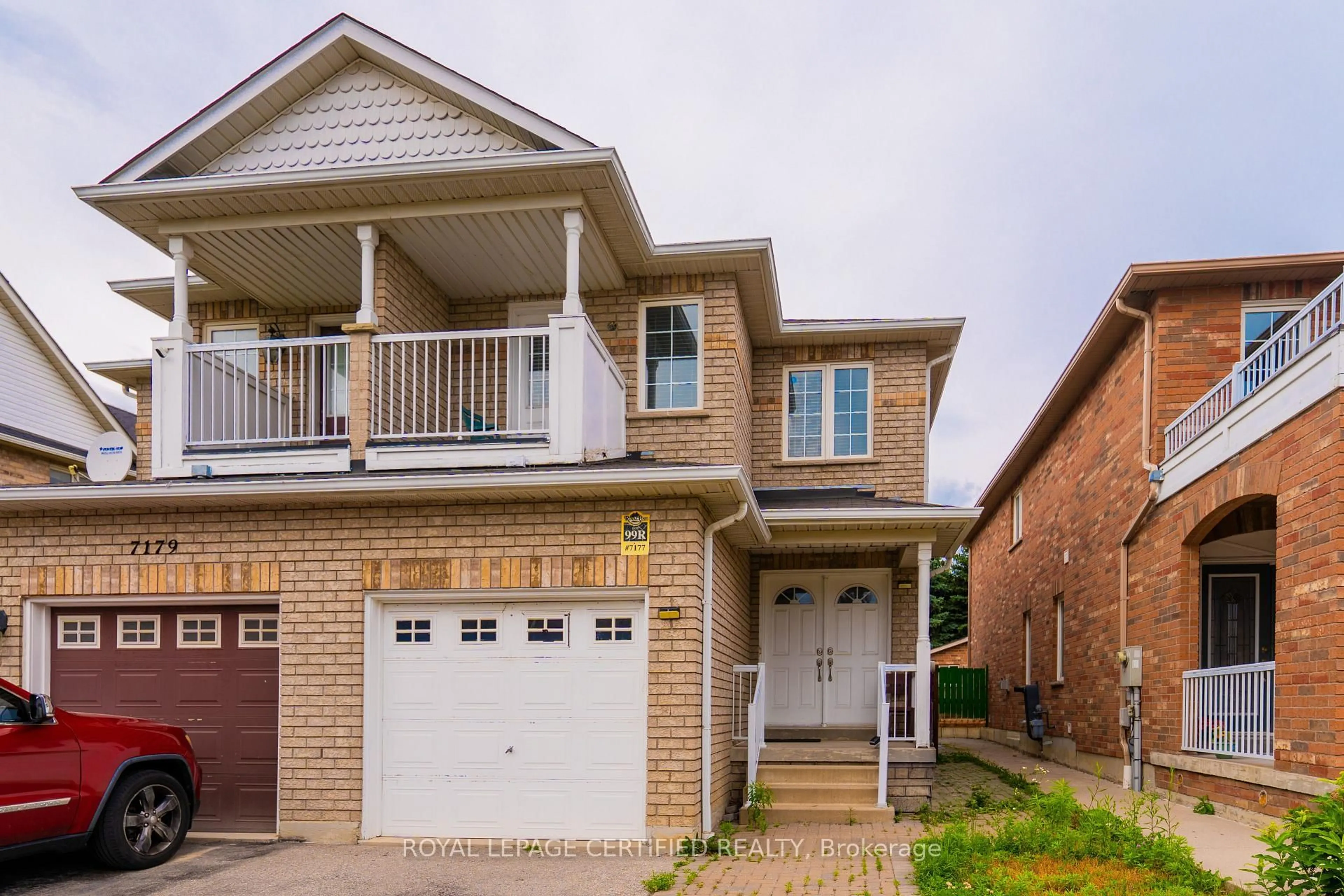 Home with brick exterior material, street for 7177 Village Walk, Mississauga Ontario L5W 1X2