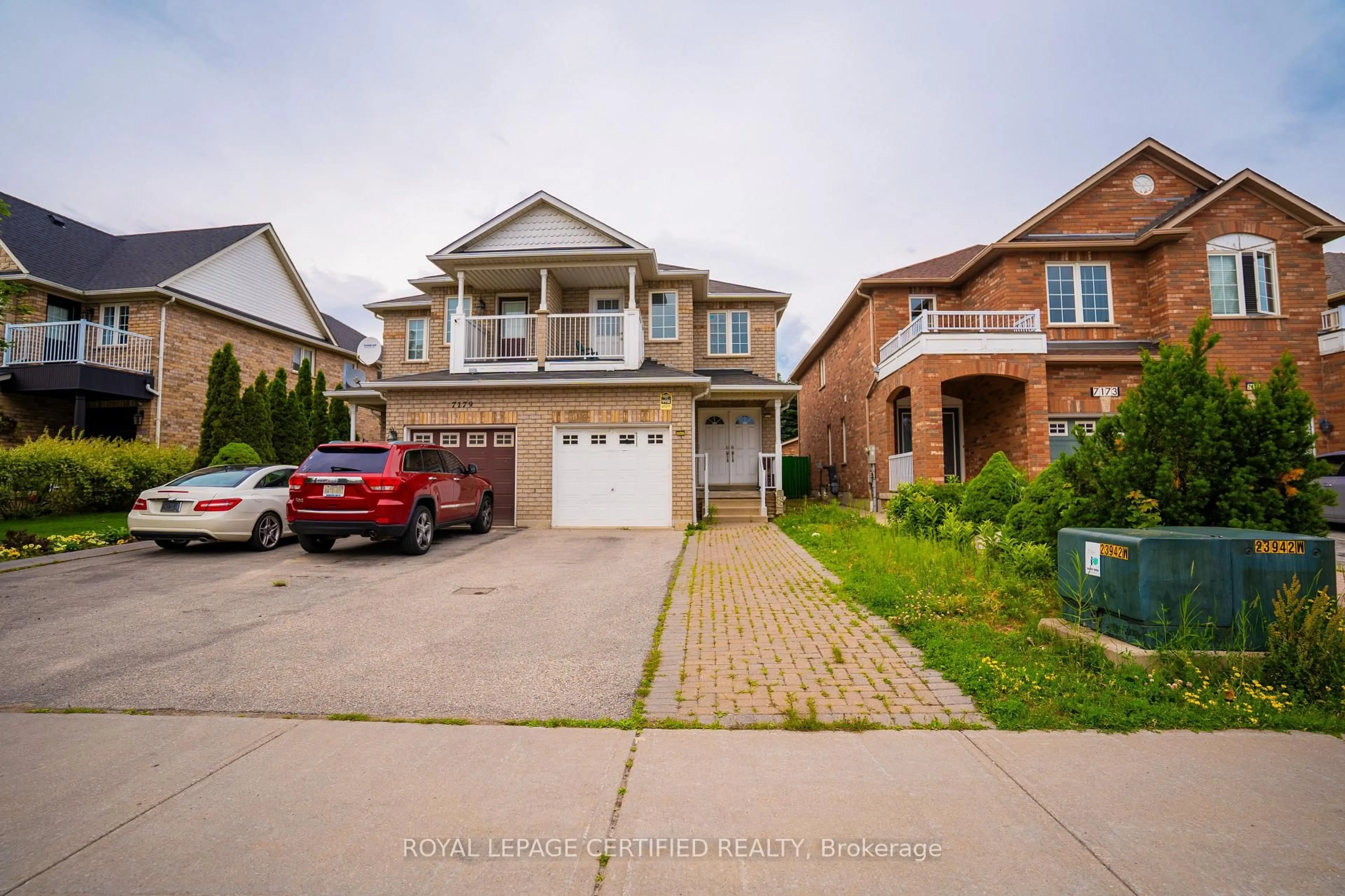 Home with brick exterior material, street for 7177 Village Walk, Mississauga Ontario L5W 1X2