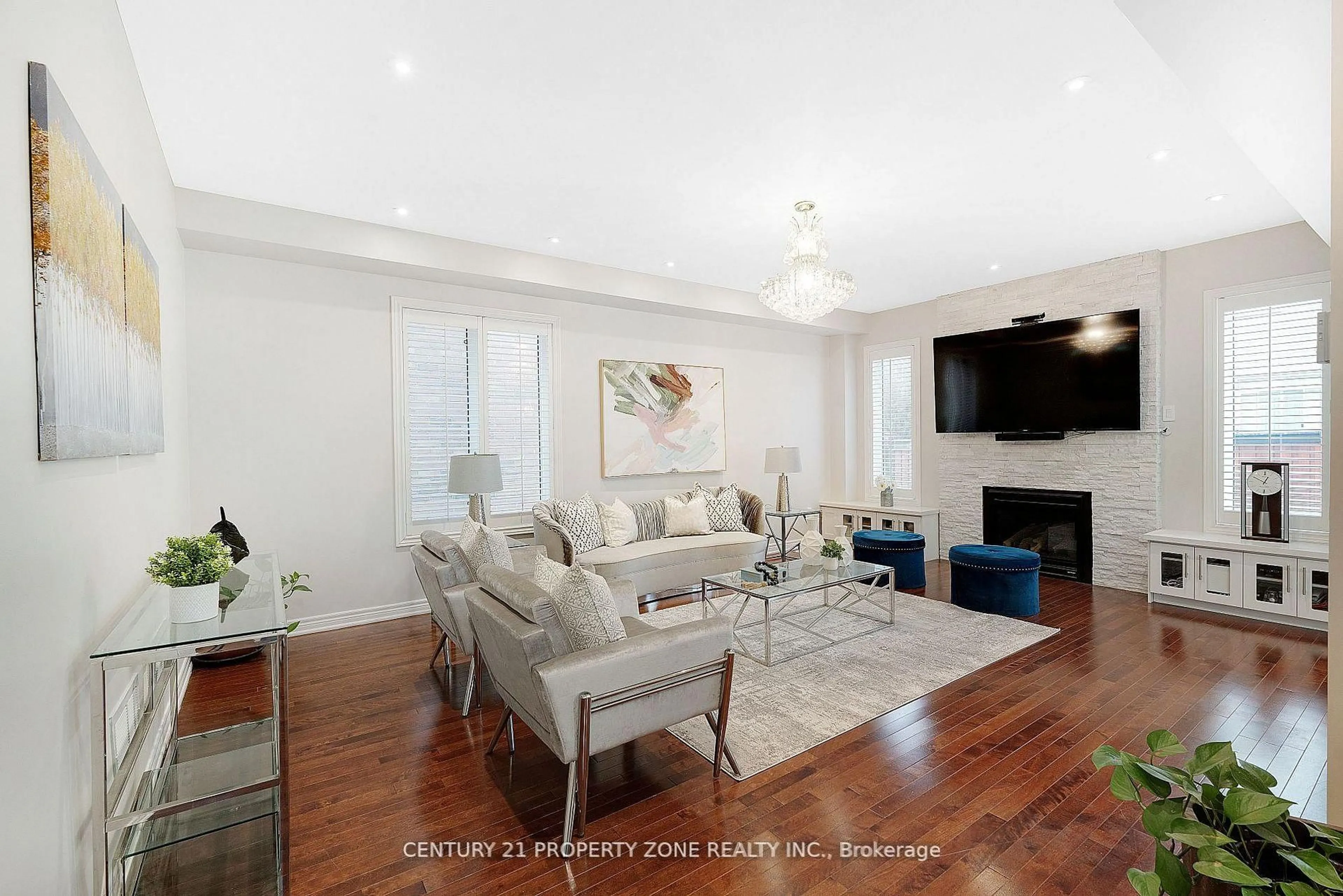 Living room with furniture, wood/laminate floor for 19 Bellcrest Rd, Brampton Ontario L6Y 2M7