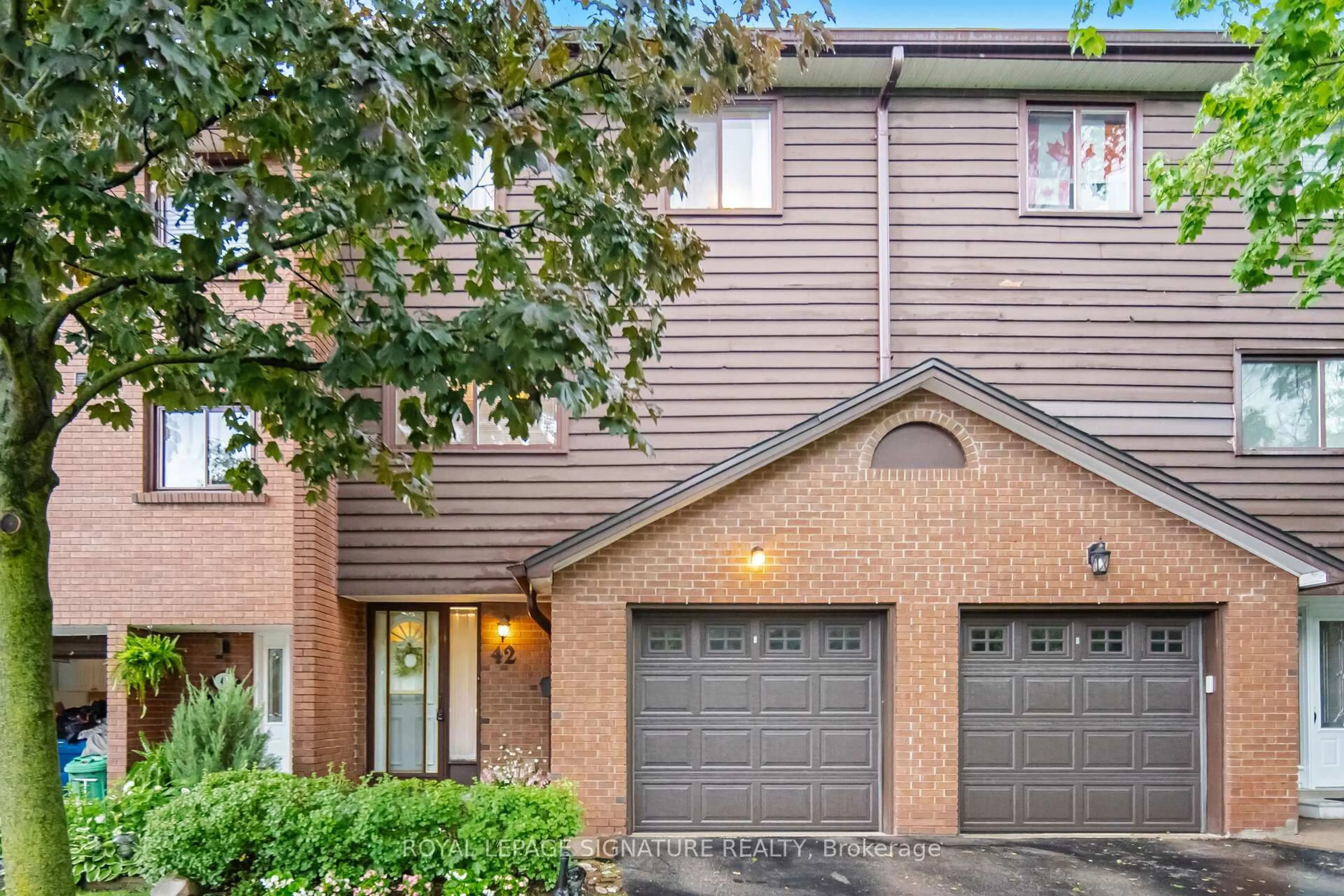 Home with brick exterior material, street for 4230 Fieldgate Dr #42, Mississauga Ontario L4W 2M5