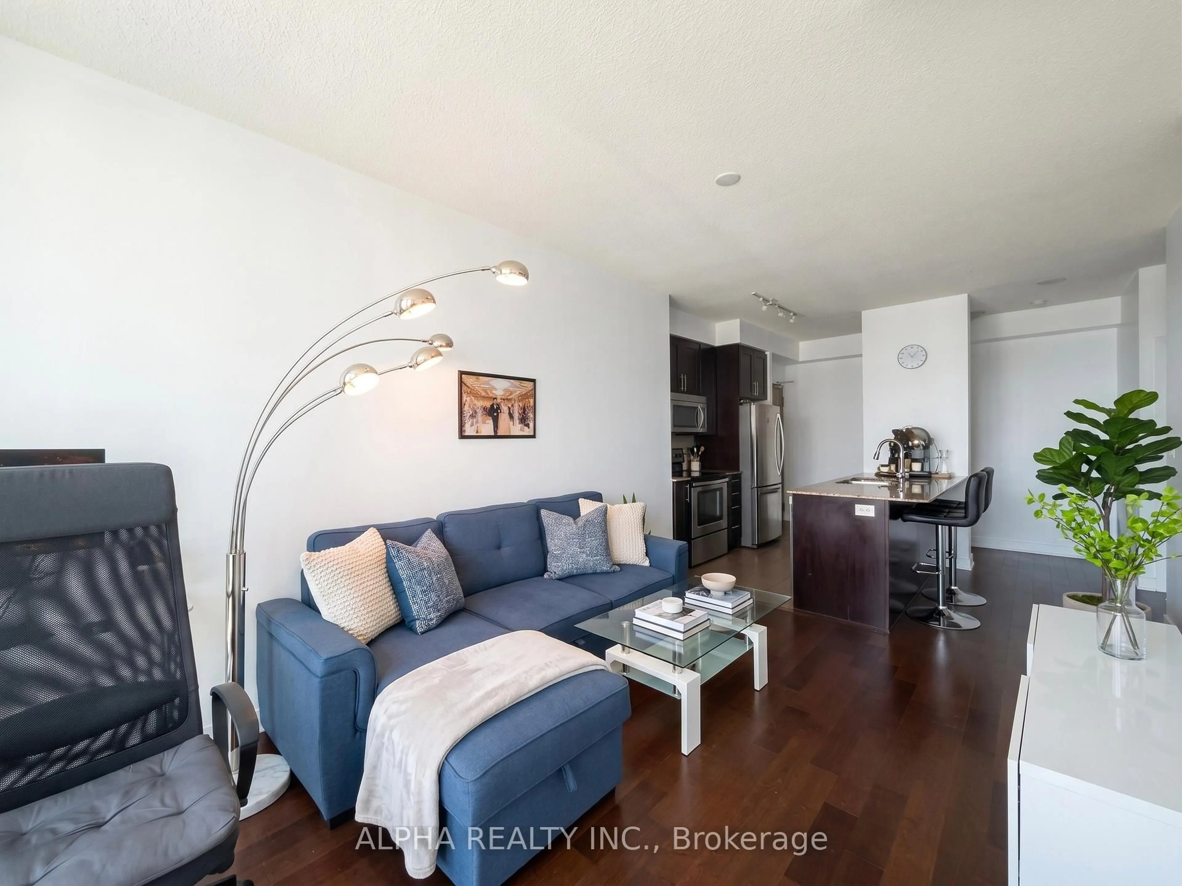 Living room with furniture, wood/laminate floor for 4065 Brickstone Mews #2801, Mississauga Ontario L5B 0G3