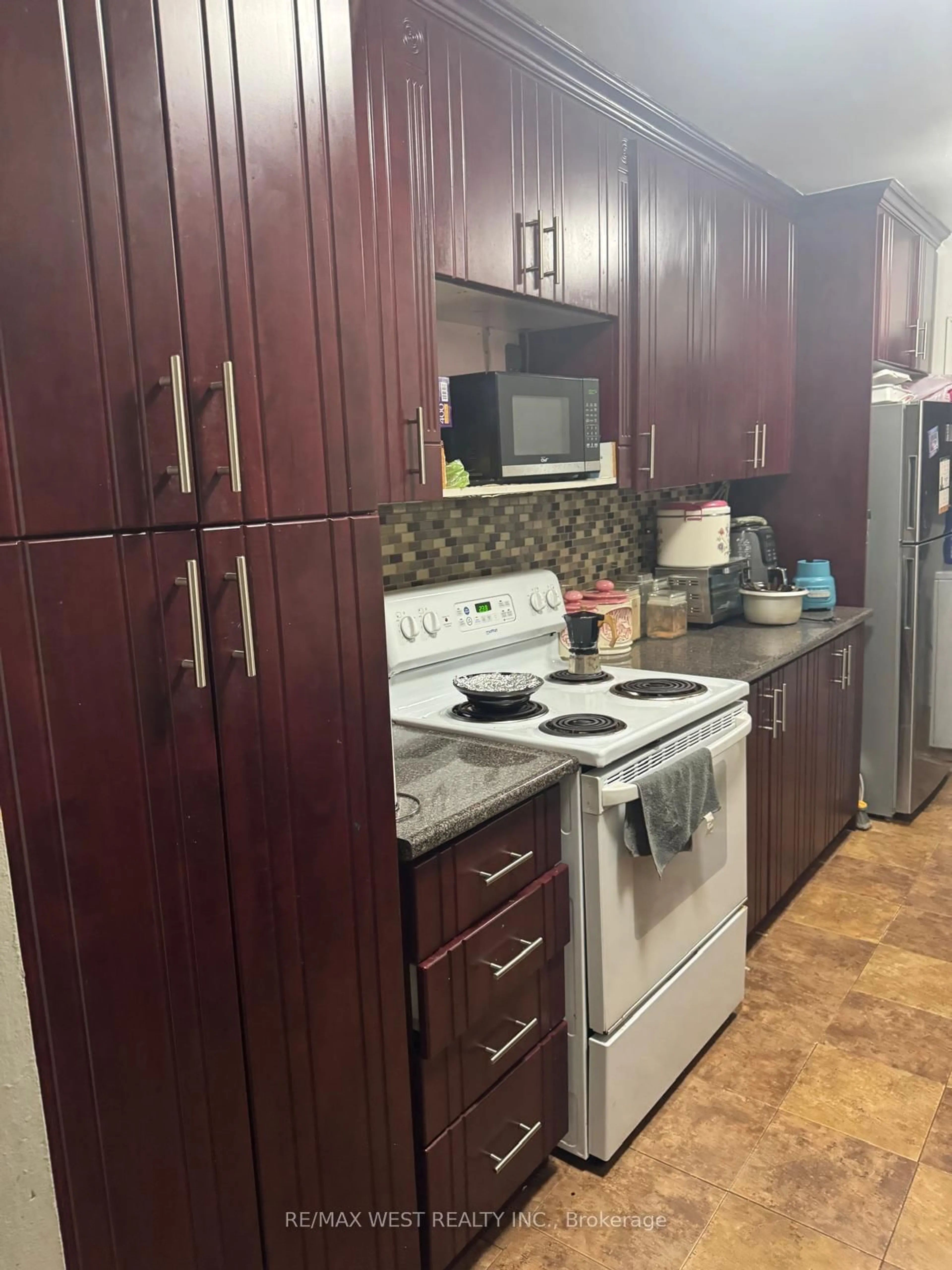 Standard kitchen, wood/laminate floor for 390 Dixon Rd #2309, Toronto Ontario M9R 1T4
