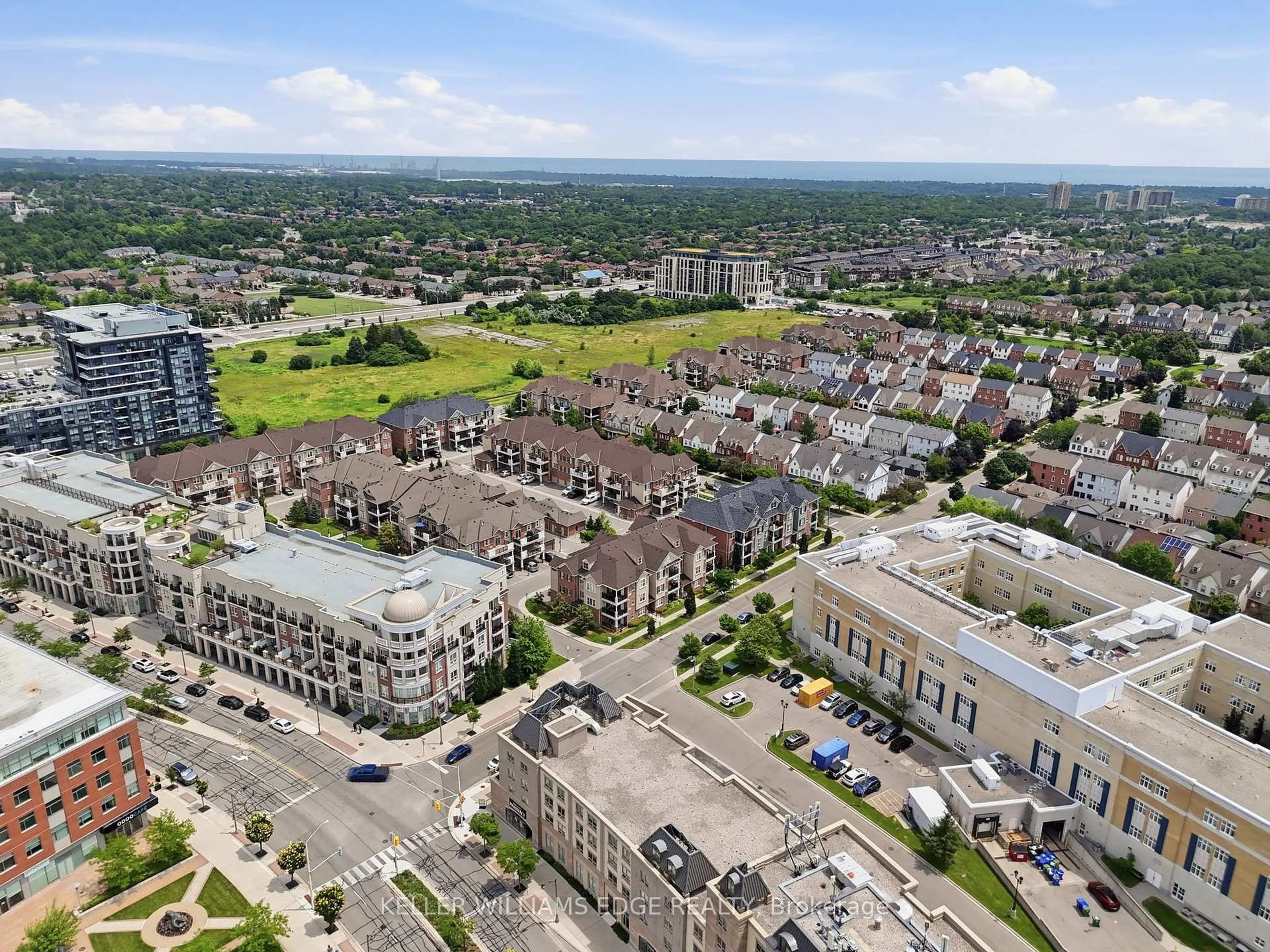 A pic from outside/outdoor area/front of a property/back of a property/a pic from drone, unknown for 263 Georgian Dr #306, Oakville Ontario L6H 0L2