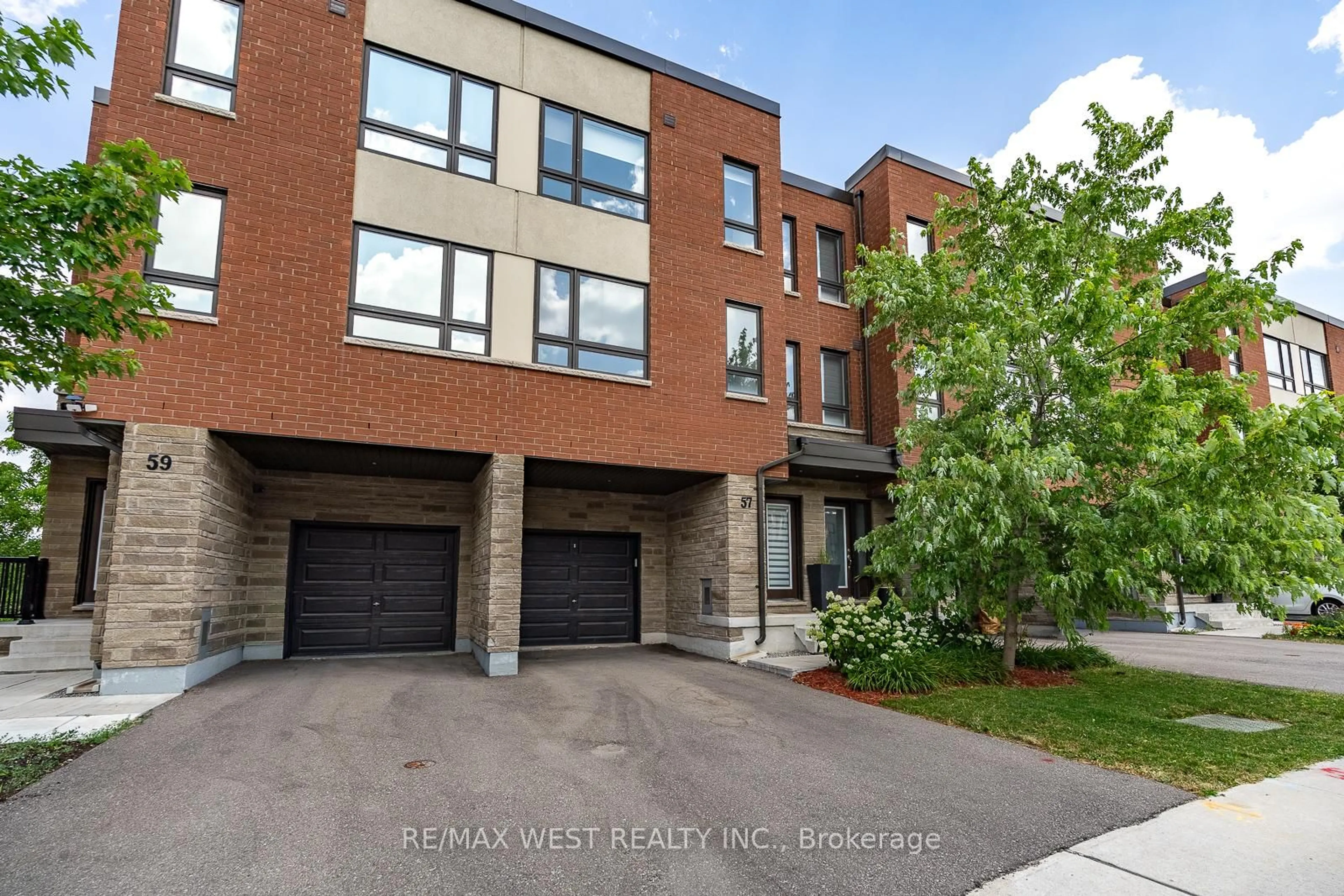 Home with brick exterior material, street for 57 Woodstream Dr, Toronto Ontario M9W 0G1