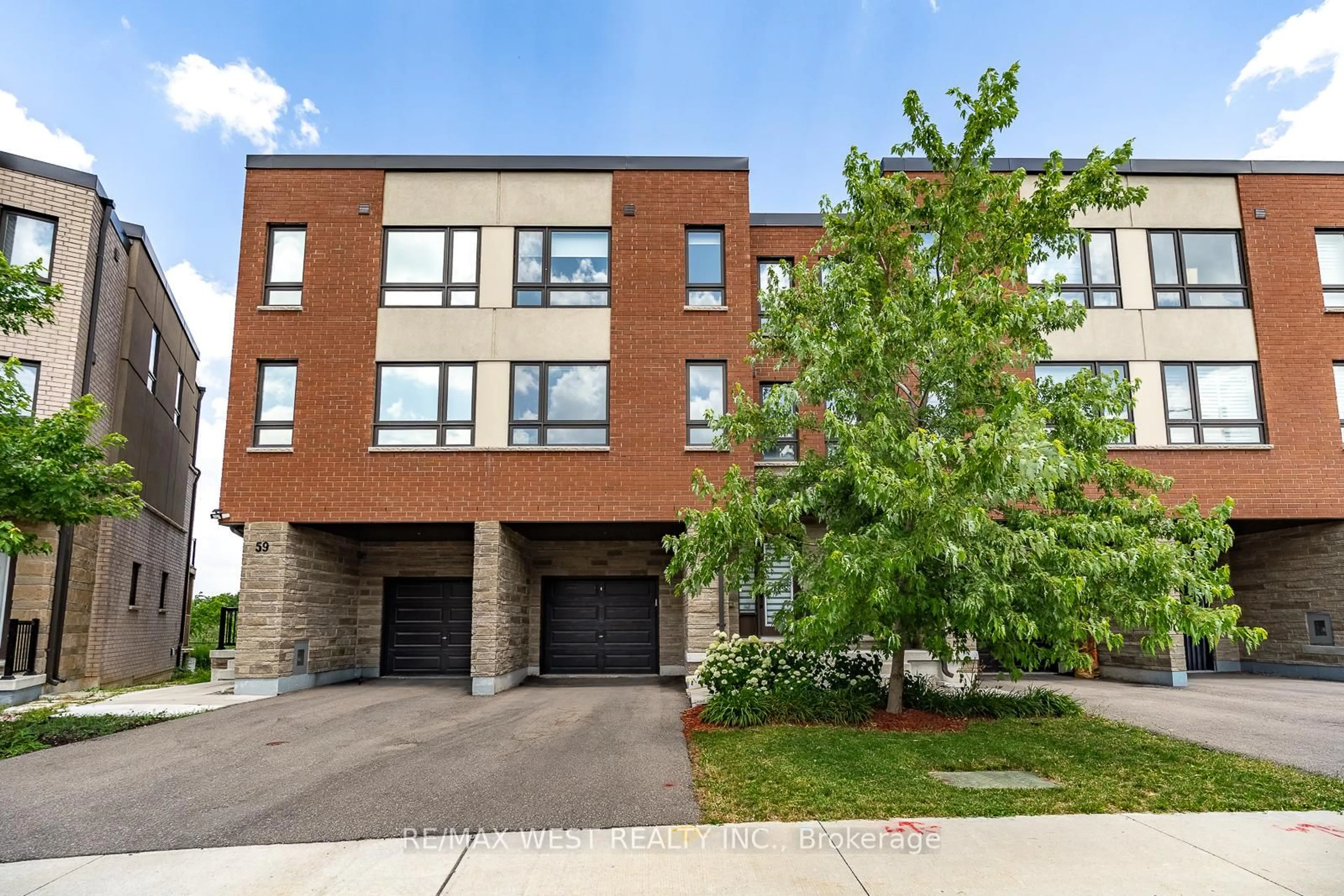 Home with brick exterior material, street for 57 Woodstream Dr, Toronto Ontario M9W 0G1
