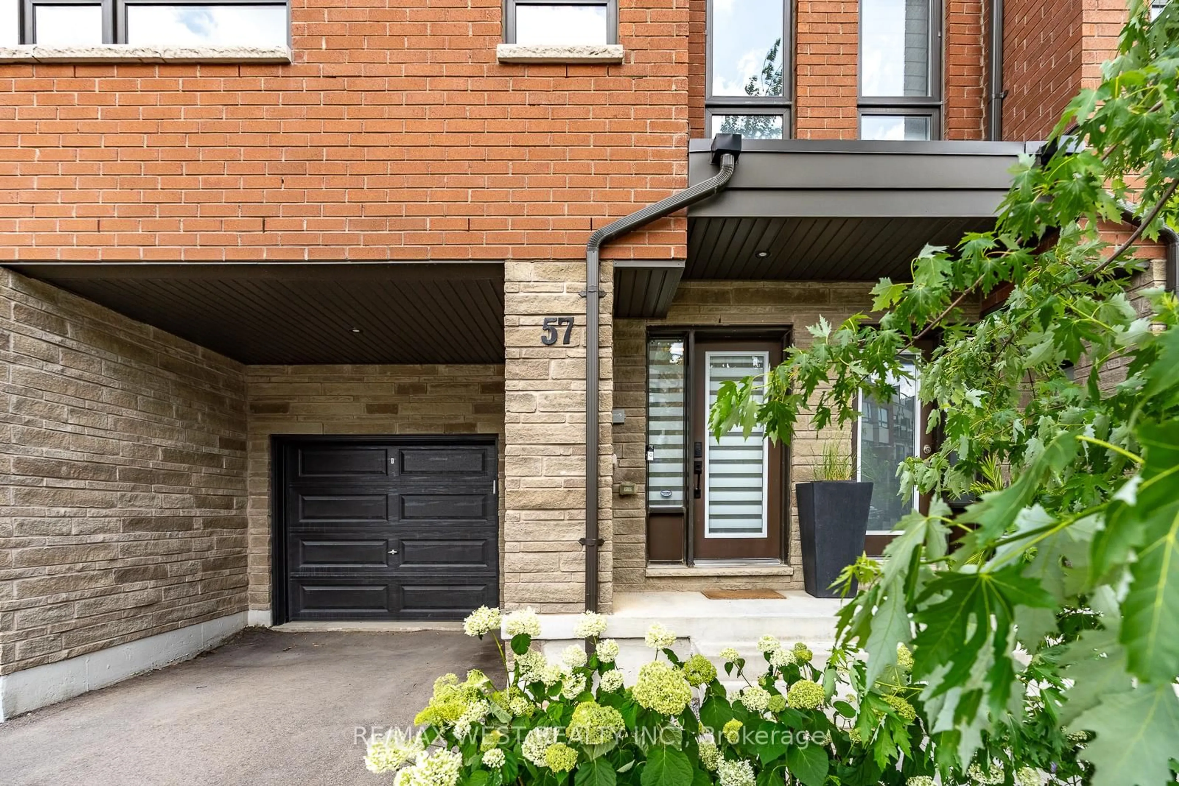 Home with brick exterior material, street for 57 Woodstream Dr, Toronto Ontario M9W 0G1