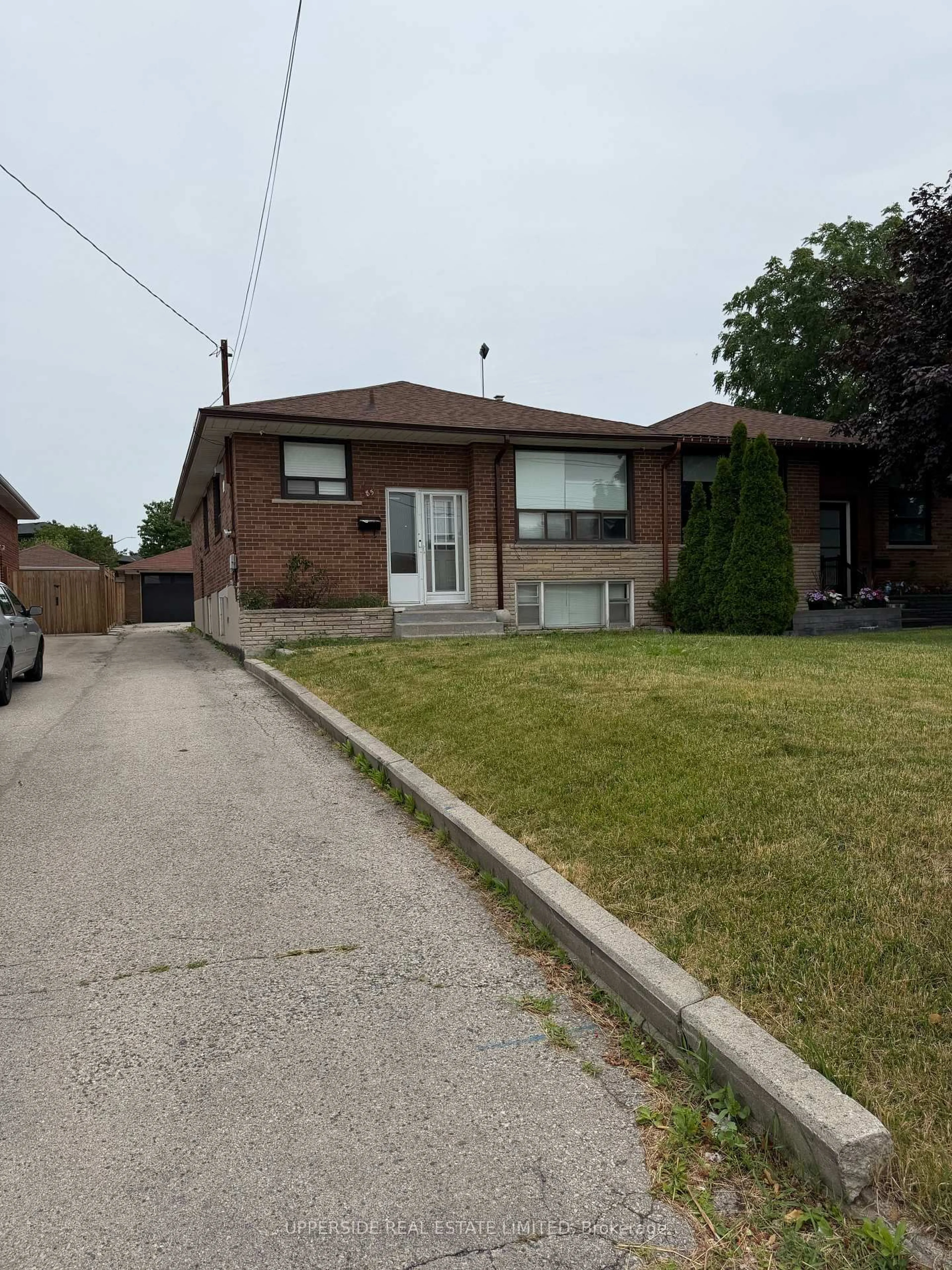 Home with brick exterior material, street for 85 Mulholland Ave, Toronto Ontario M6A 2S5