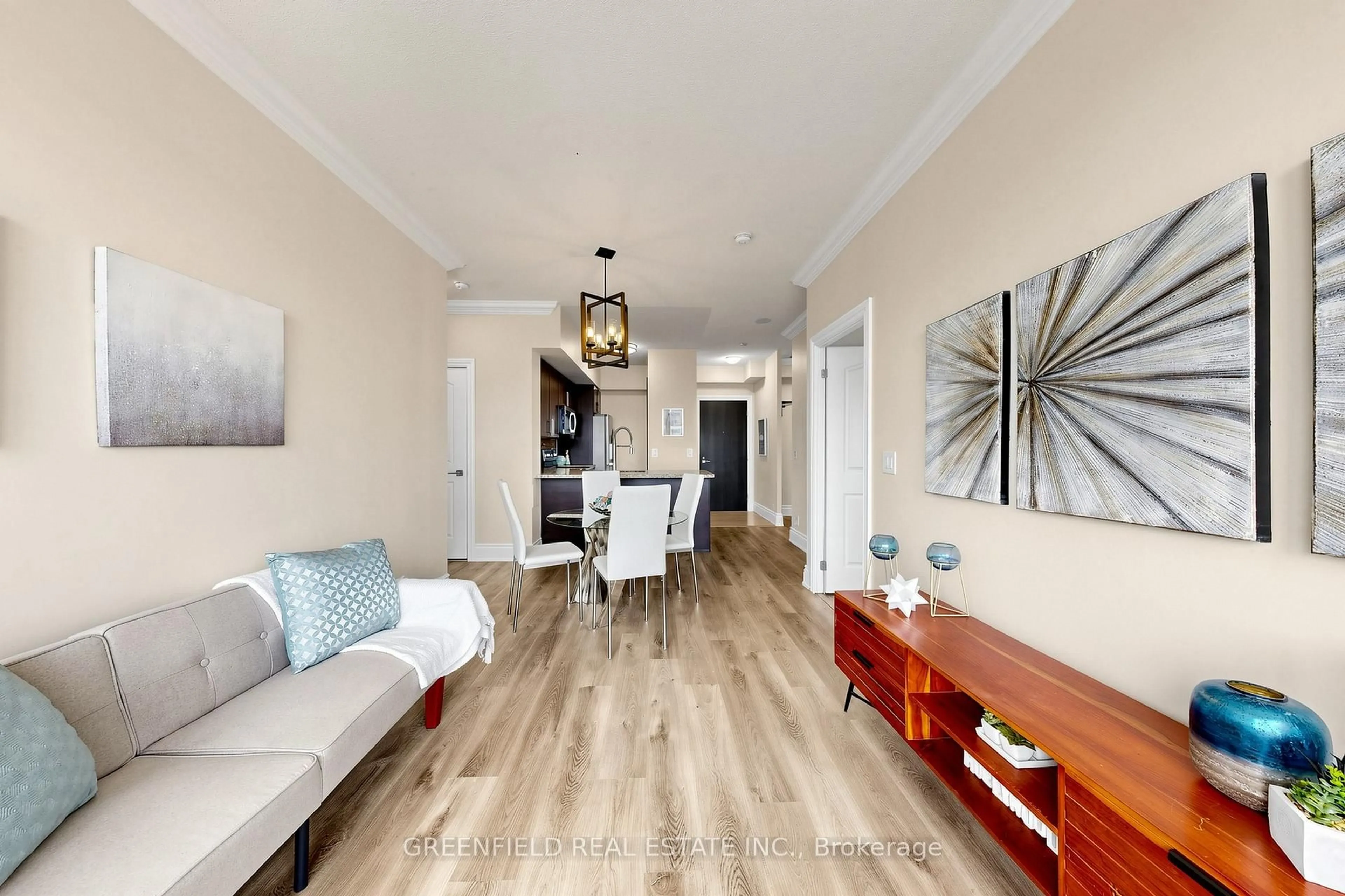 Living room with furniture, wood/laminate floor for 55 De Boers Dr #LPH2, Toronto Ontario M3J 0G5