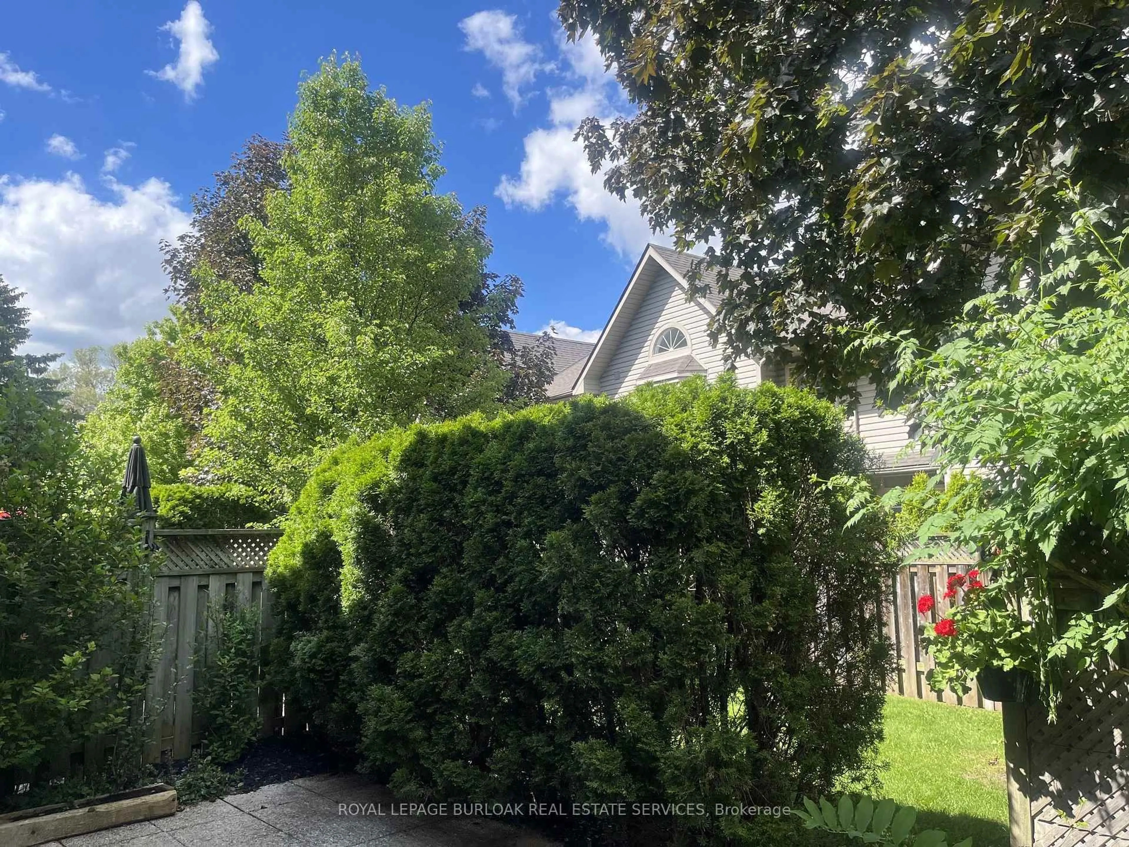 A pic from outside/outdoor area/front of a property/back of a property/a pic from drone, forest/trees view for 3333 New St #19, Burlington Ontario L7N 1N1