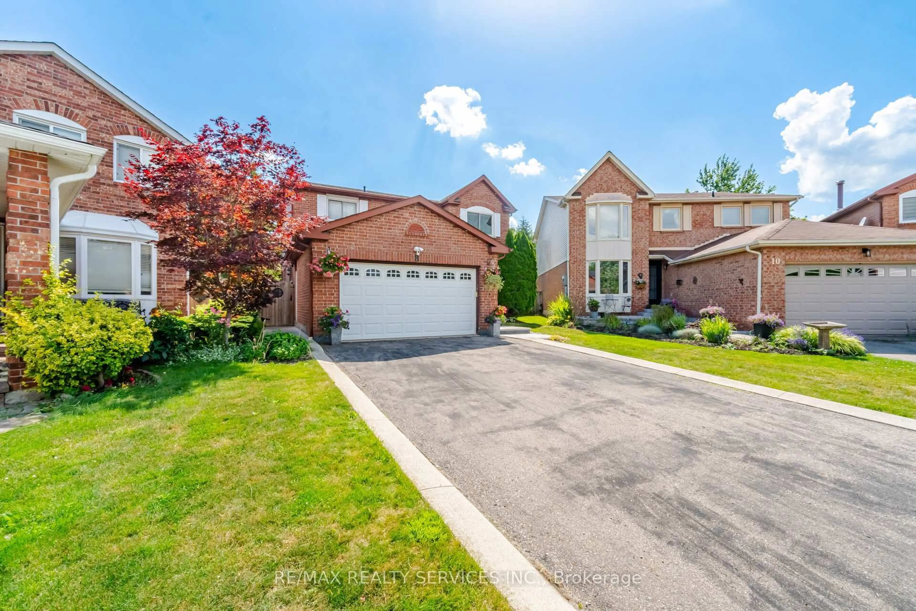 Home with brick exterior material, street for 8 Paramount Pl, Brampton Ontario L6Y 2T3