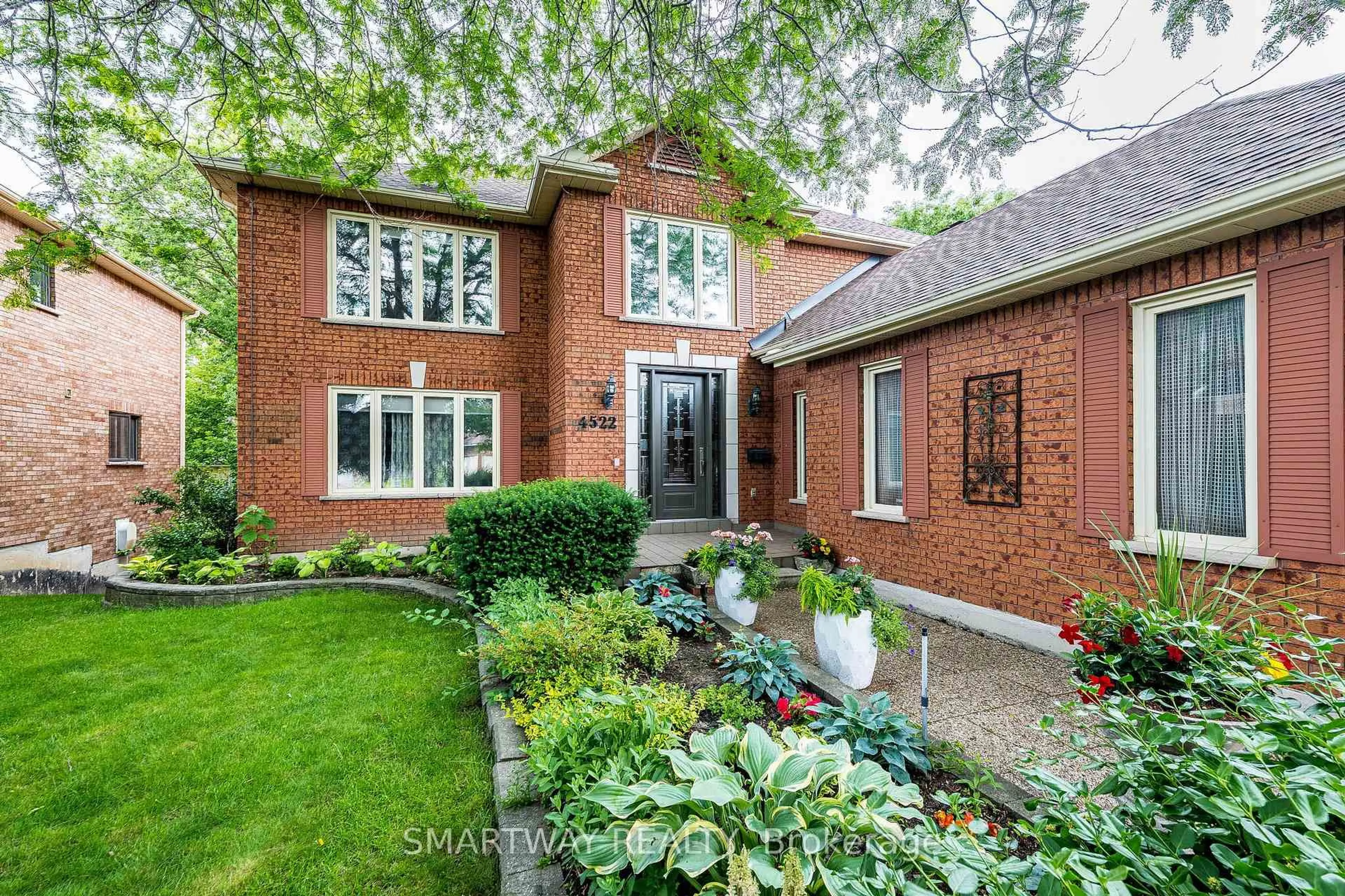 Home with brick exterior material, street for 4522 Badminton Dr, Mississauga Ontario L5M 3H7