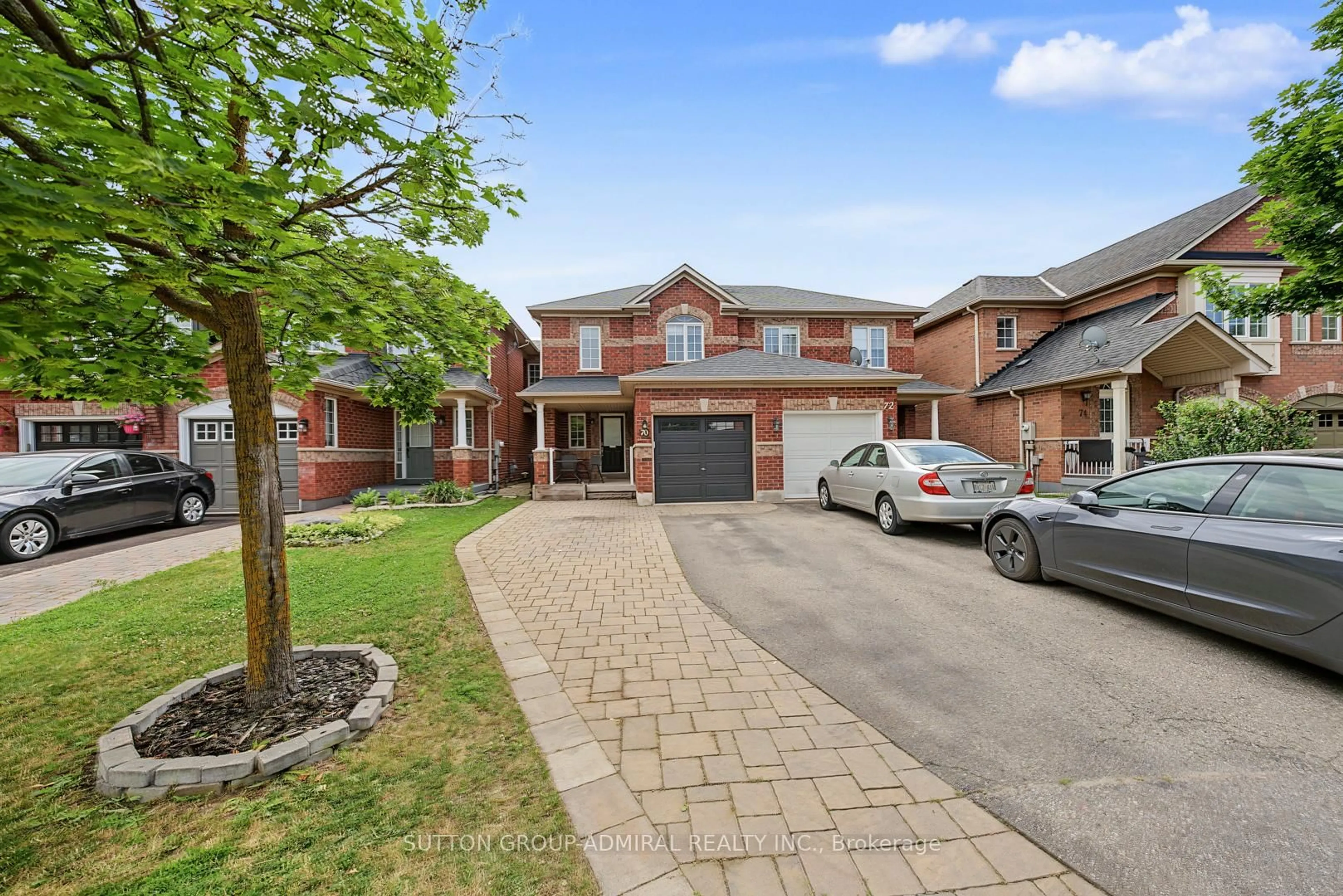 Home with brick exterior material, street for 70 Winners Circ, Brampton Ontario L7A 1W2