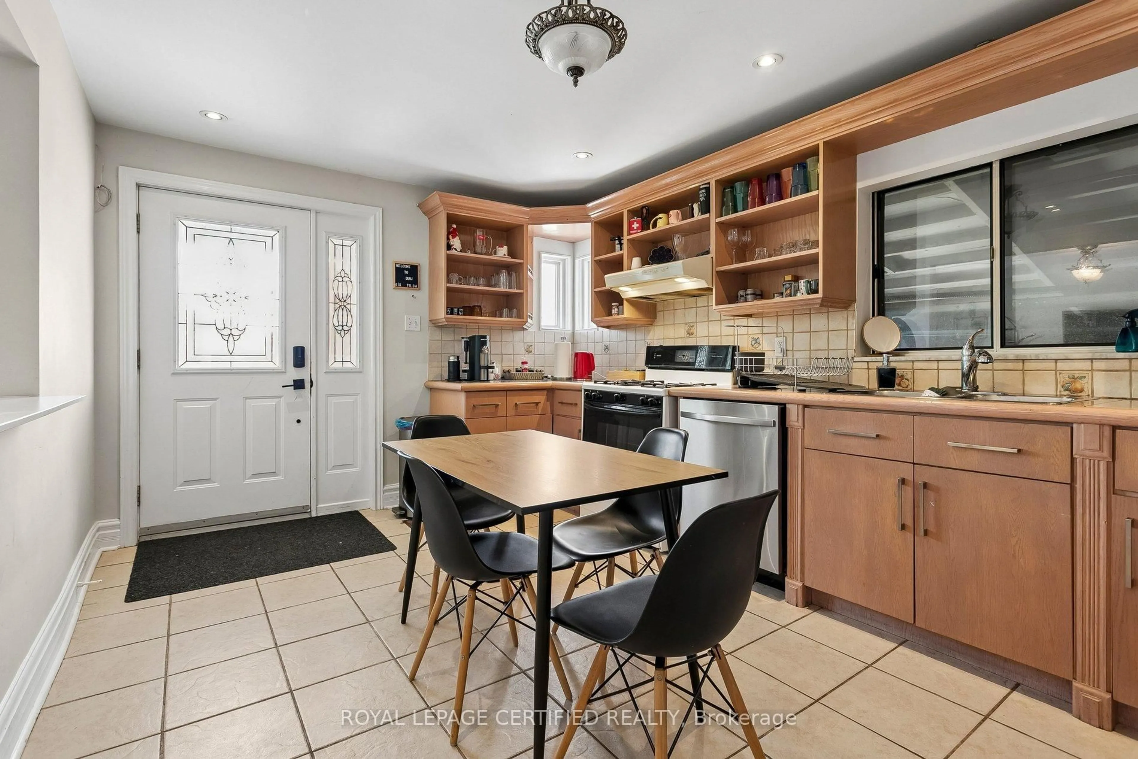 Open concept kitchen, ceramic/tile floor for 33 Donald Ave, Toronto Ontario M6M 1J9
