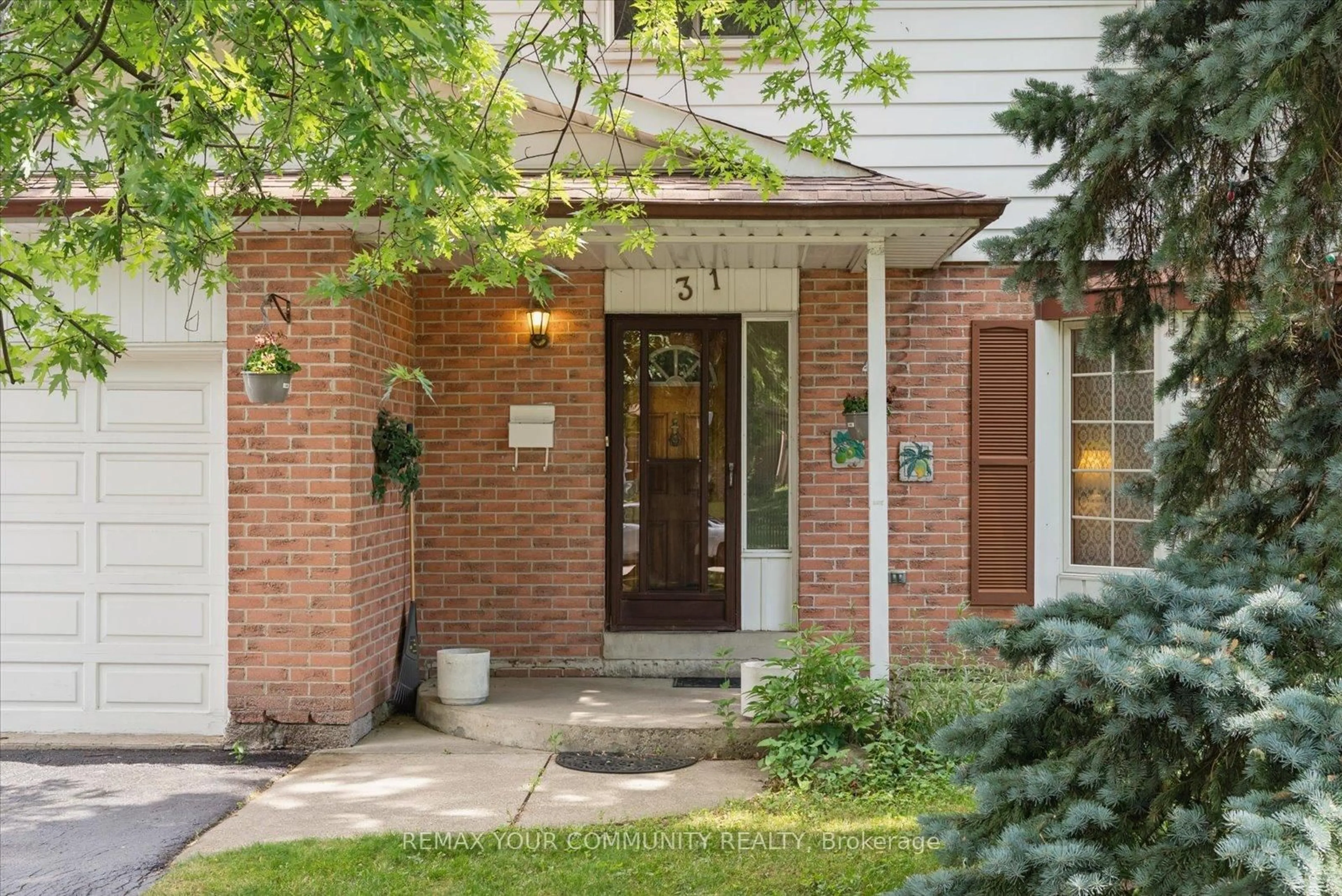 Home with brick exterior material, street for 31 Deloraine Dr, Brampton Ontario L6T 1T6