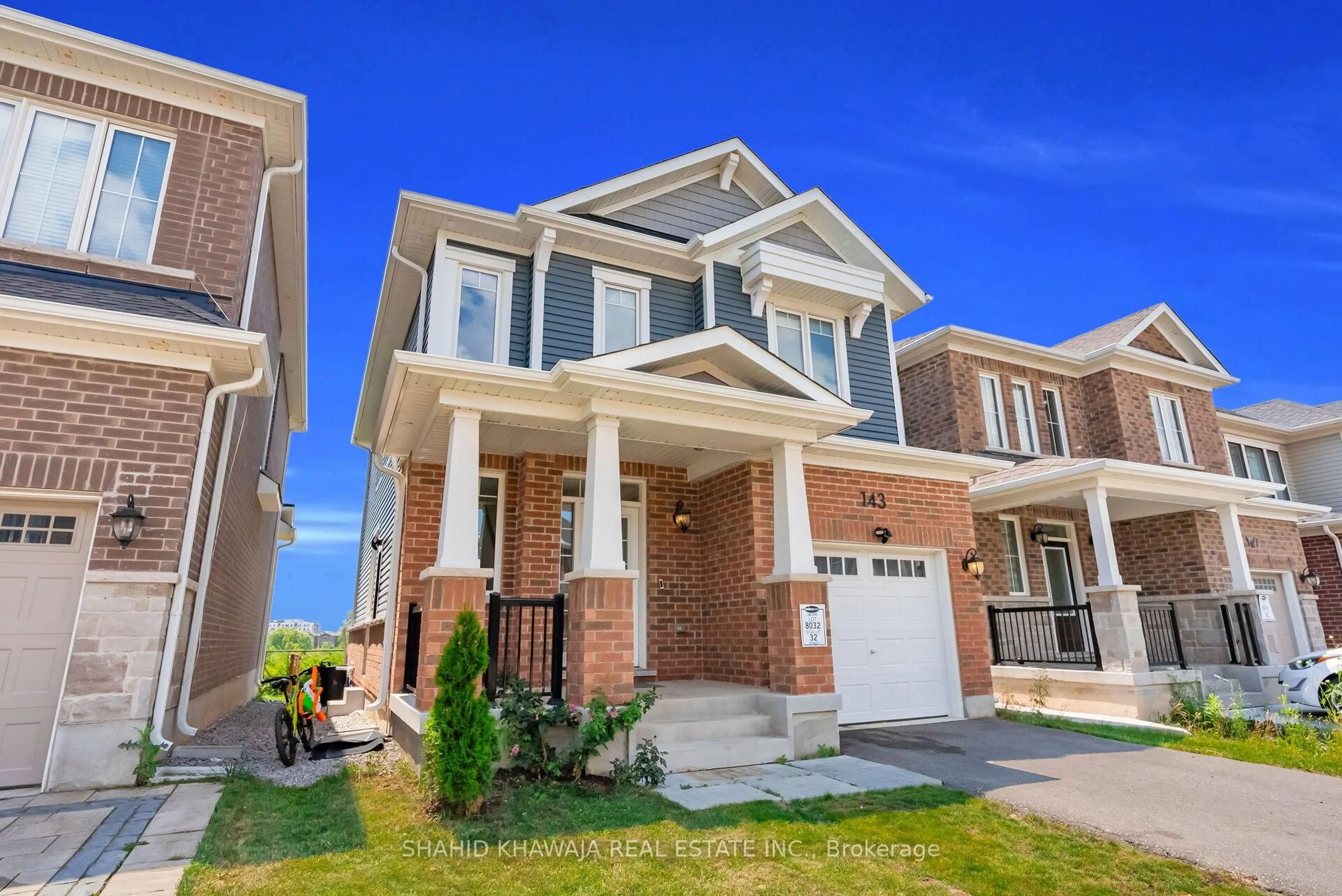 Home with brick exterior material, street for 143 Yates Dr, Milton Ontario L9E 1S7