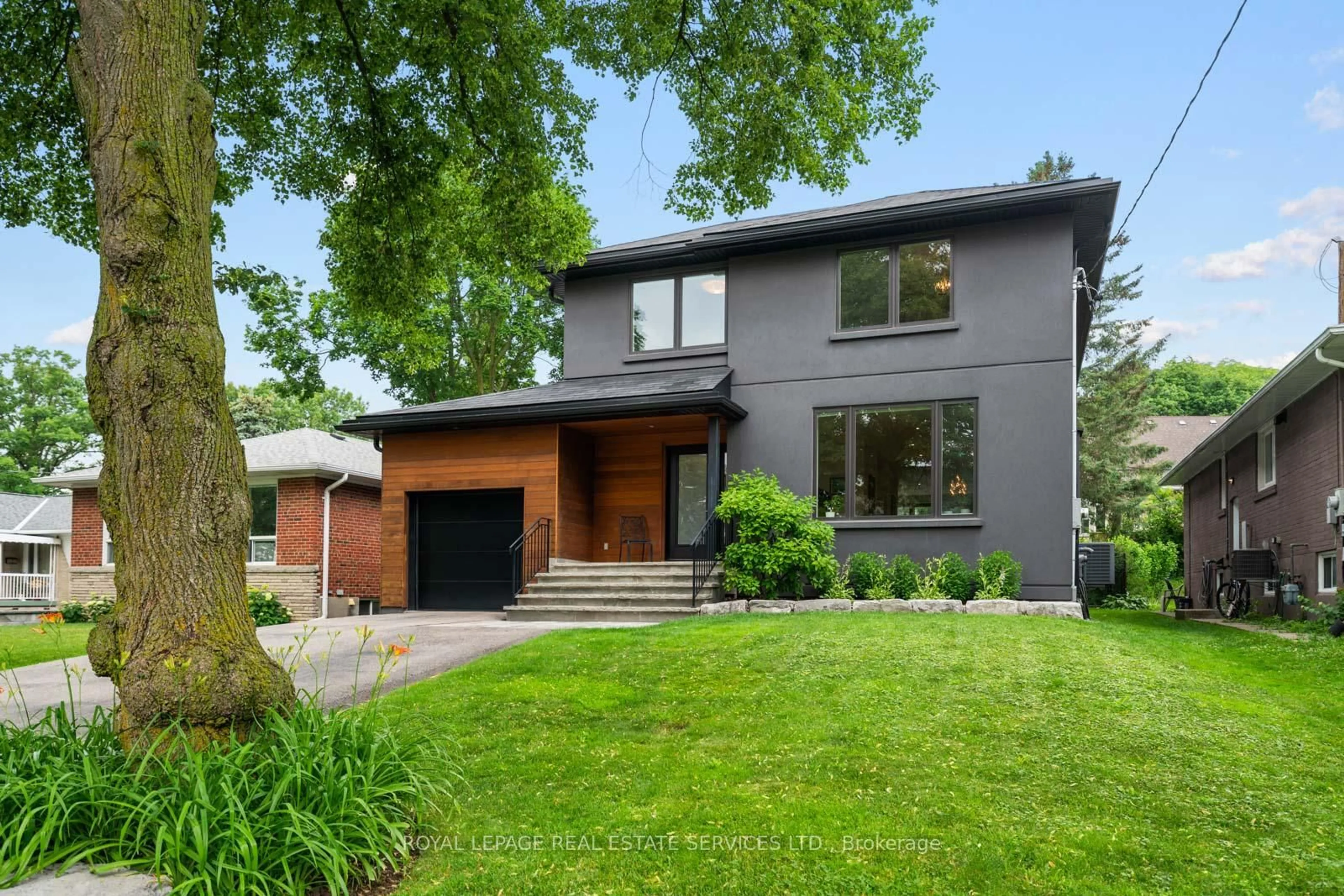 Home with brick exterior material, street for 8 Firwood Cres, Toronto Ontario M9B 2V7