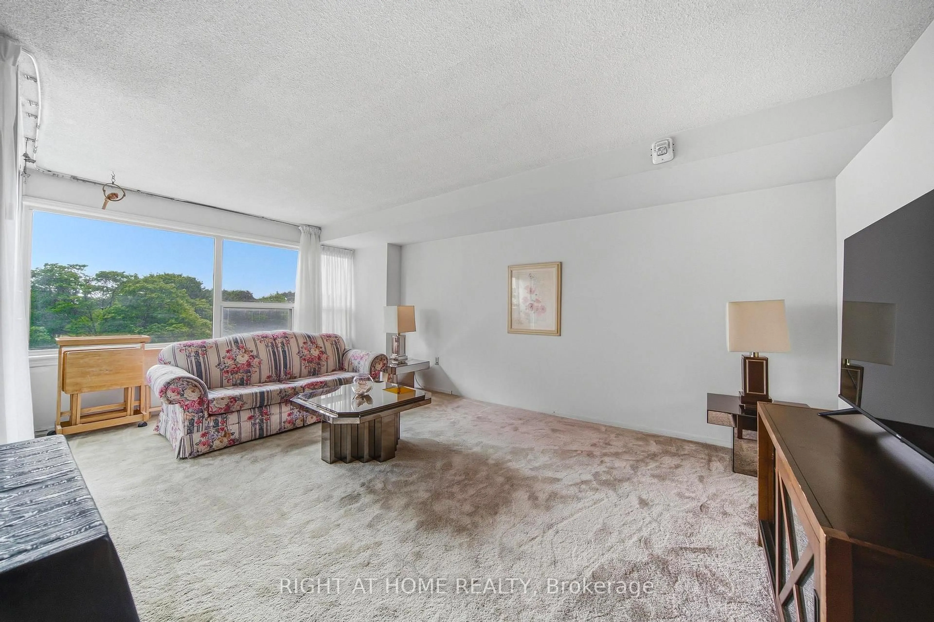 Living room with furniture, unknown for 475 The West Mall #419, Toronto Ontario M9C 4Z3