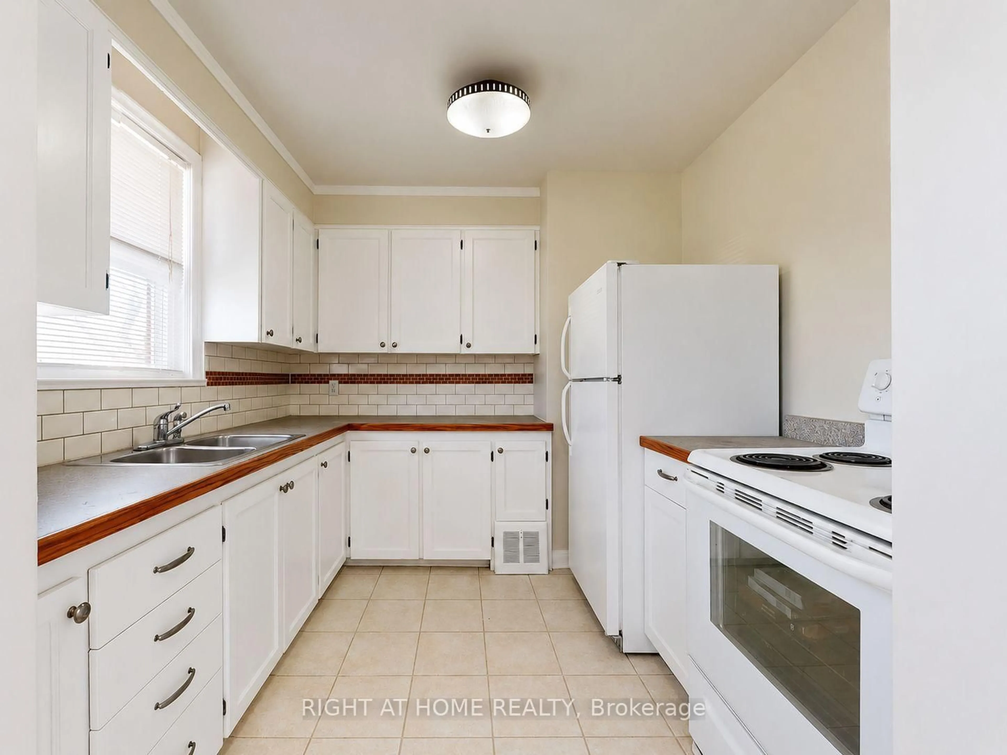 Standard kitchen, unknown for 48 Loney Ave, Toronto Ontario M3L 1E9