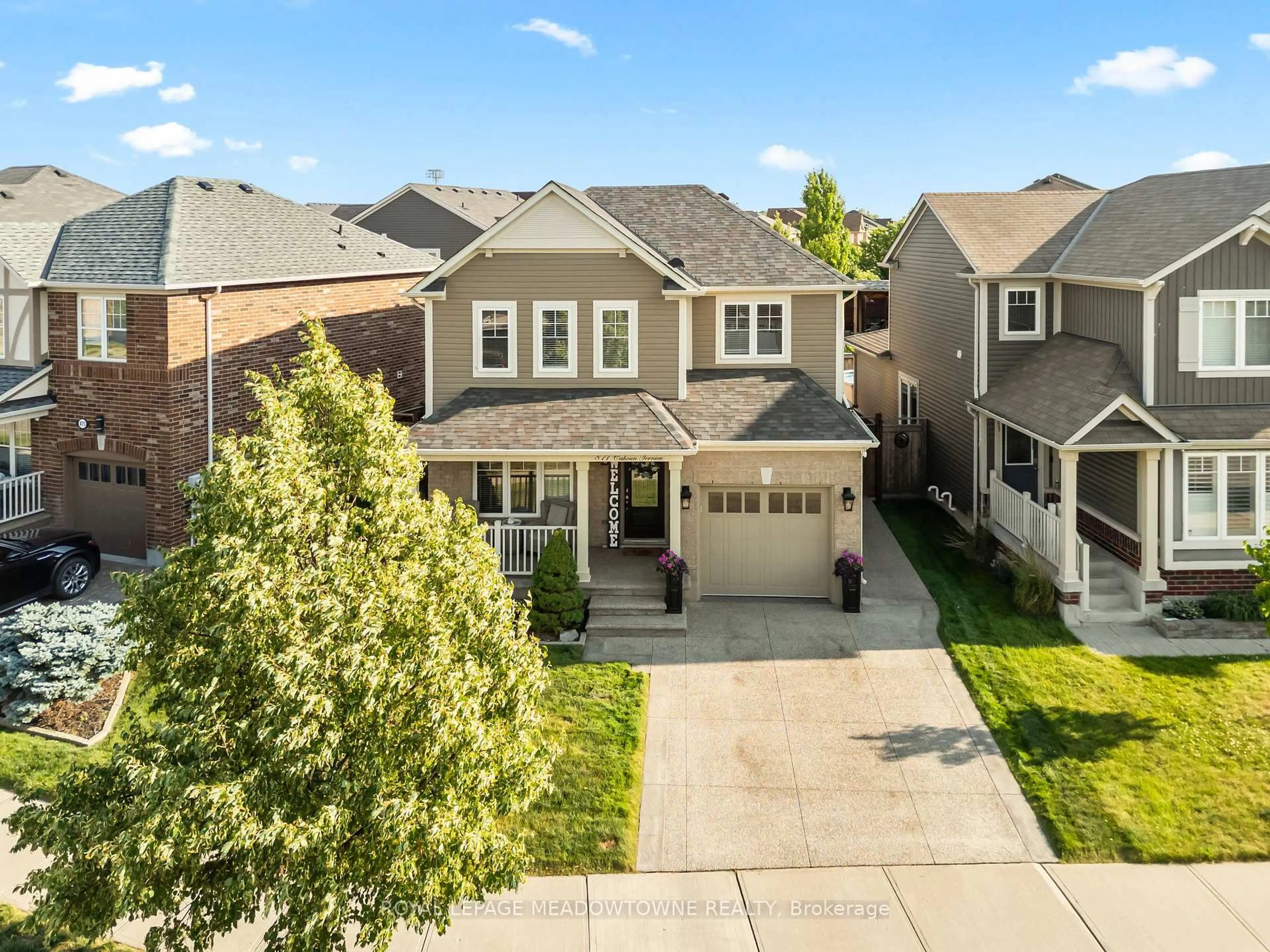A pic from outside/outdoor area/front of a property/back of a property/a pic from drone, street for 871 Cahoun Terr, Milton Ontario L9T 7S2