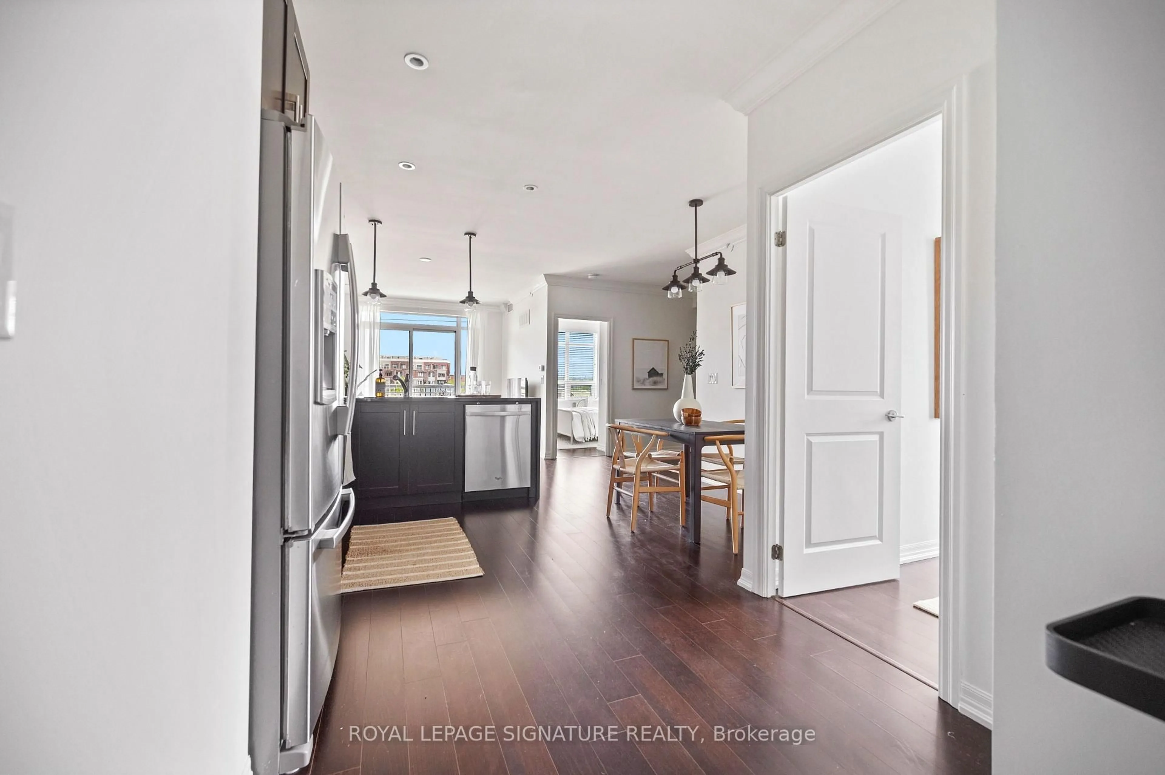 Open concept kitchen, wood/laminate floor for 3563 Lake Shore Blvd #303, Toronto Ontario M8W 0A3