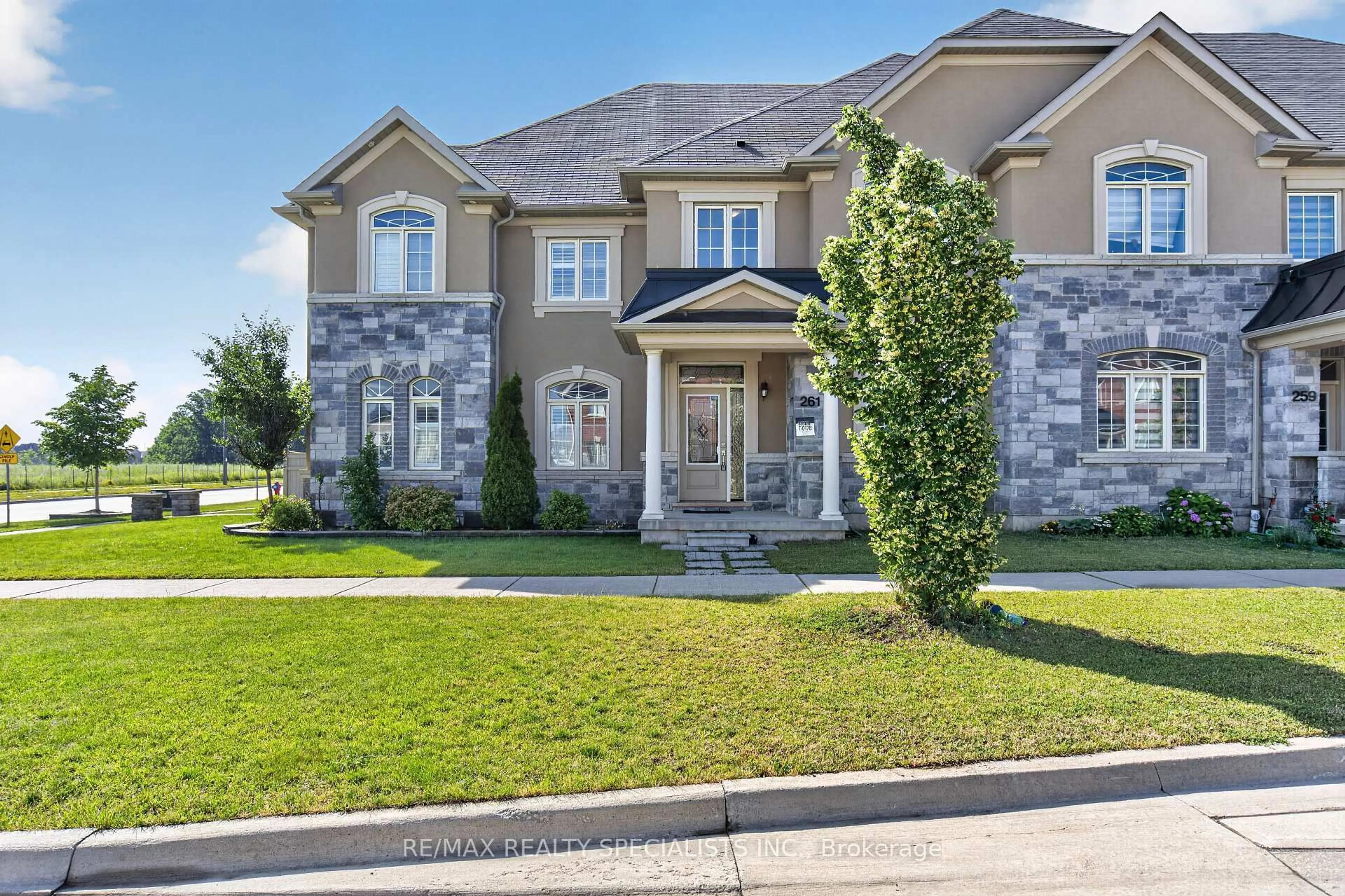 Home with brick exterior material, street for 261 INSPIRE Blvd, Brampton Ontario L6R 0B6