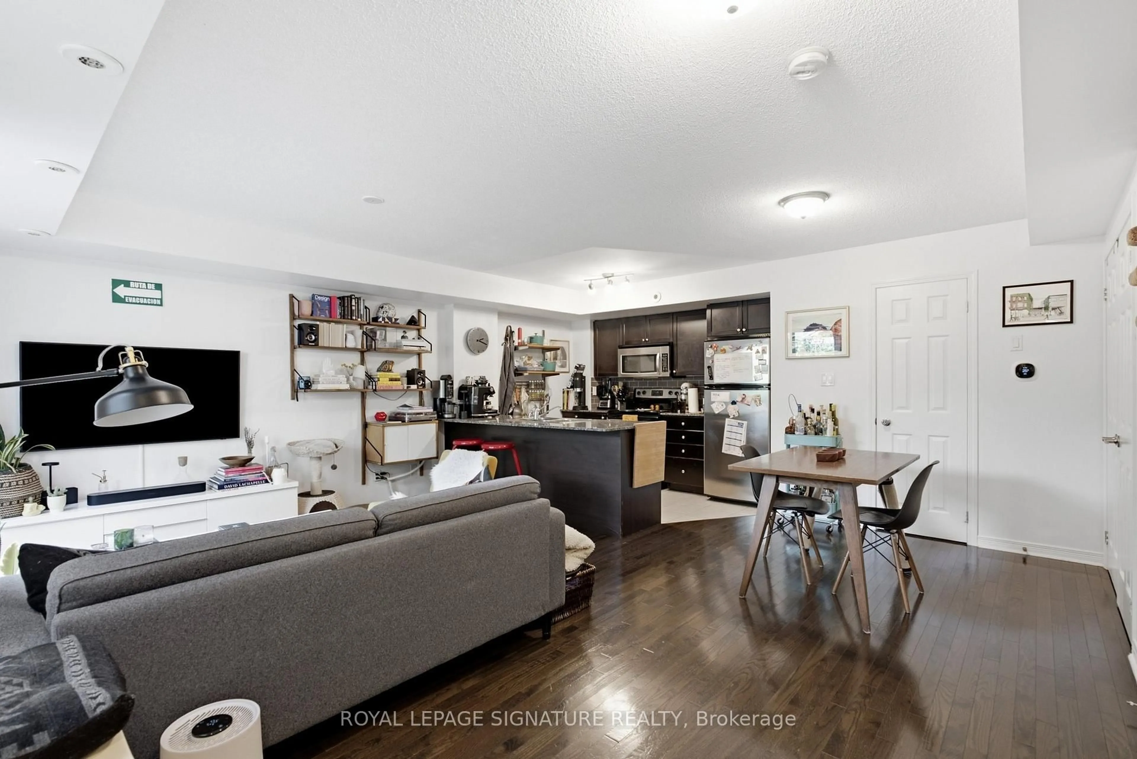 Open concept kitchen, wood/laminate floor for 5 Elsie Lane #TH135, Toronto Ontario M6P 3N3