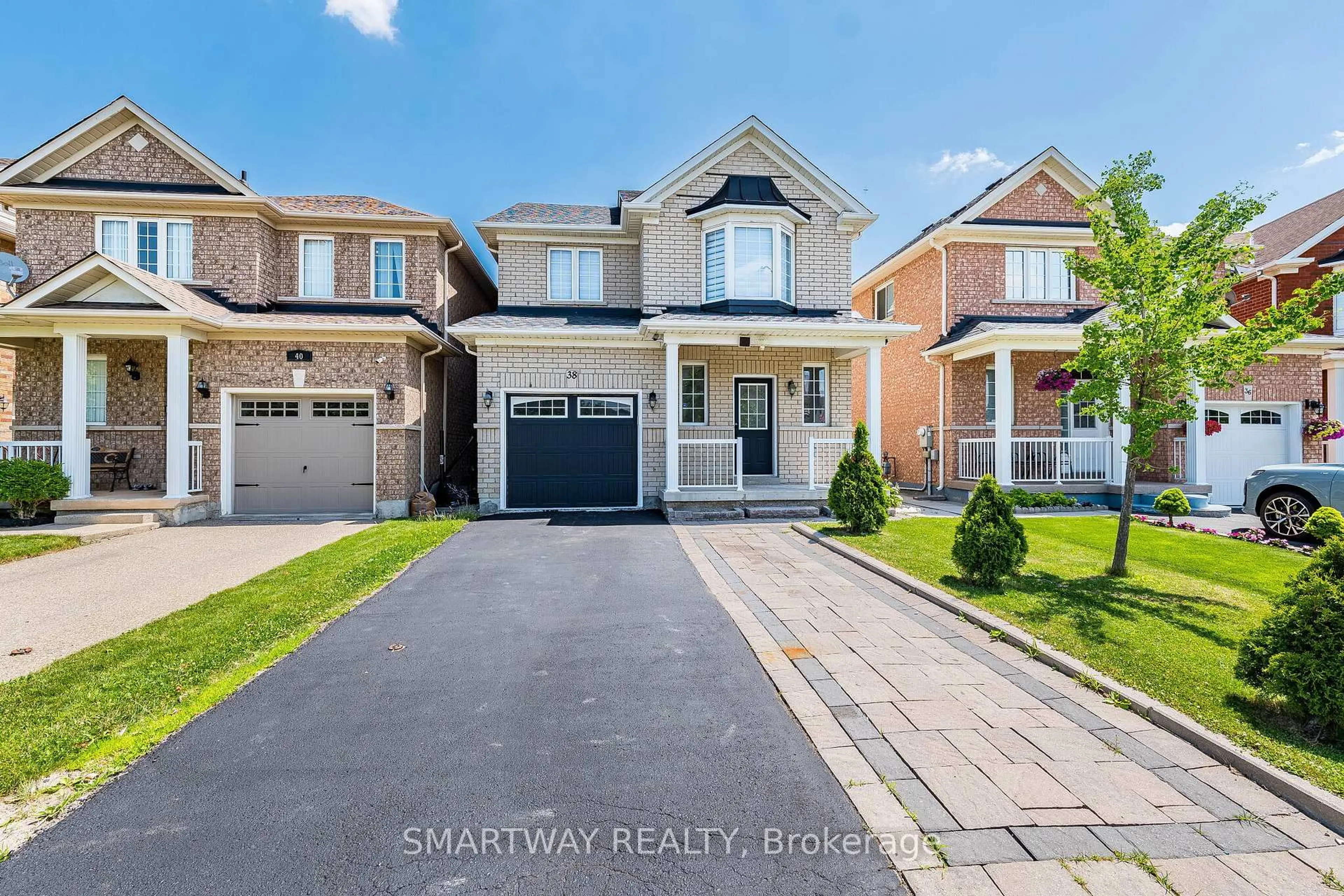Home with brick exterior material, street for 38 Lockburn Cres, Brampton Ontario L7A 3W7